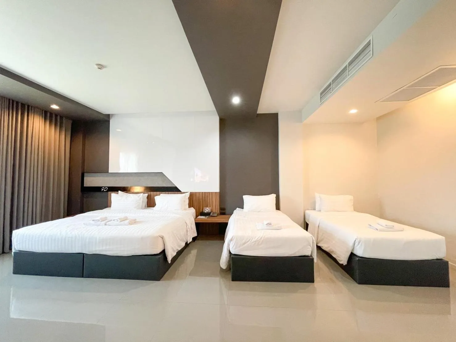 Bed in 9D Sport Hotel