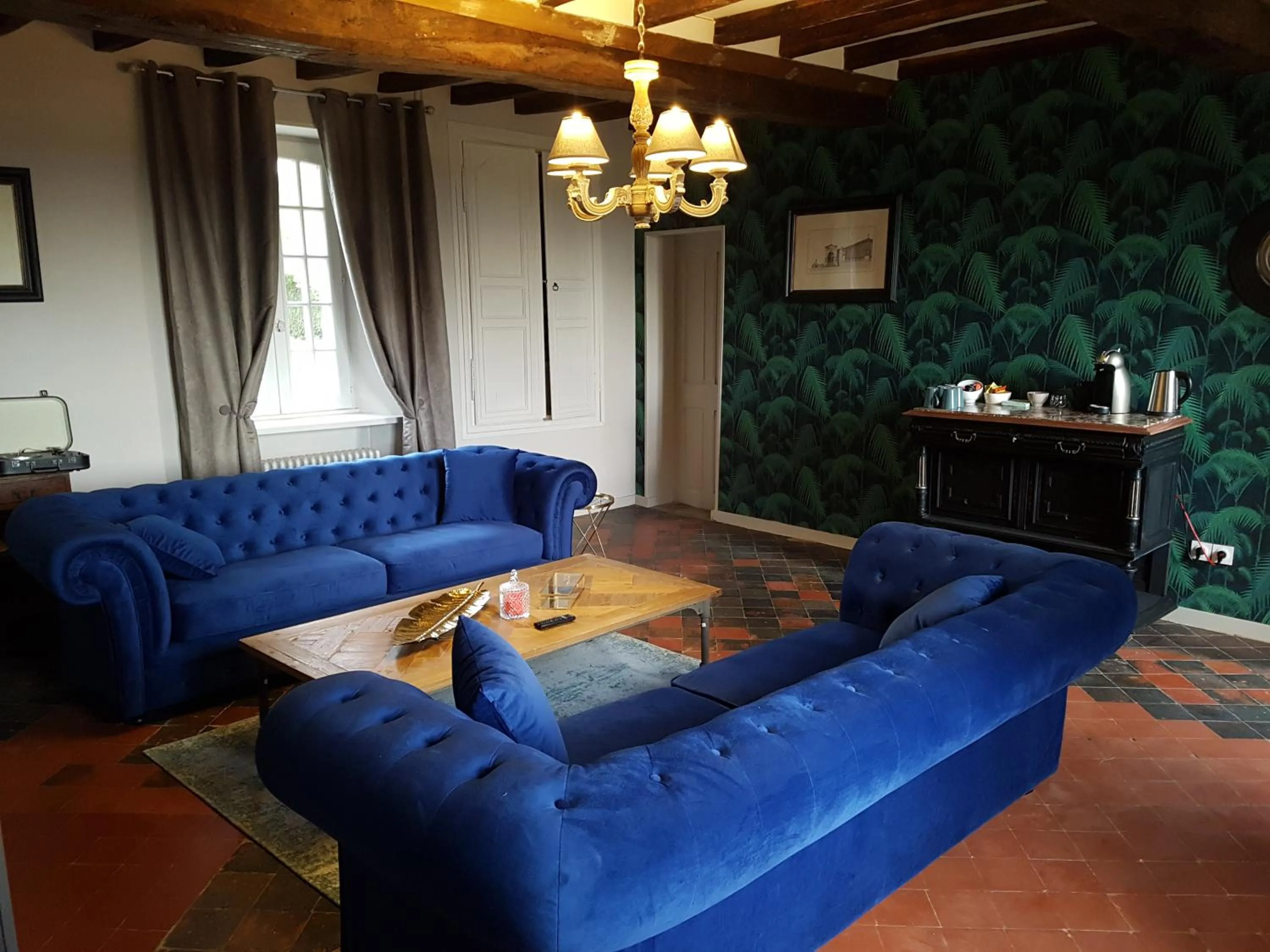 Communal lounge/ TV room in Domaine de la Fauvriere