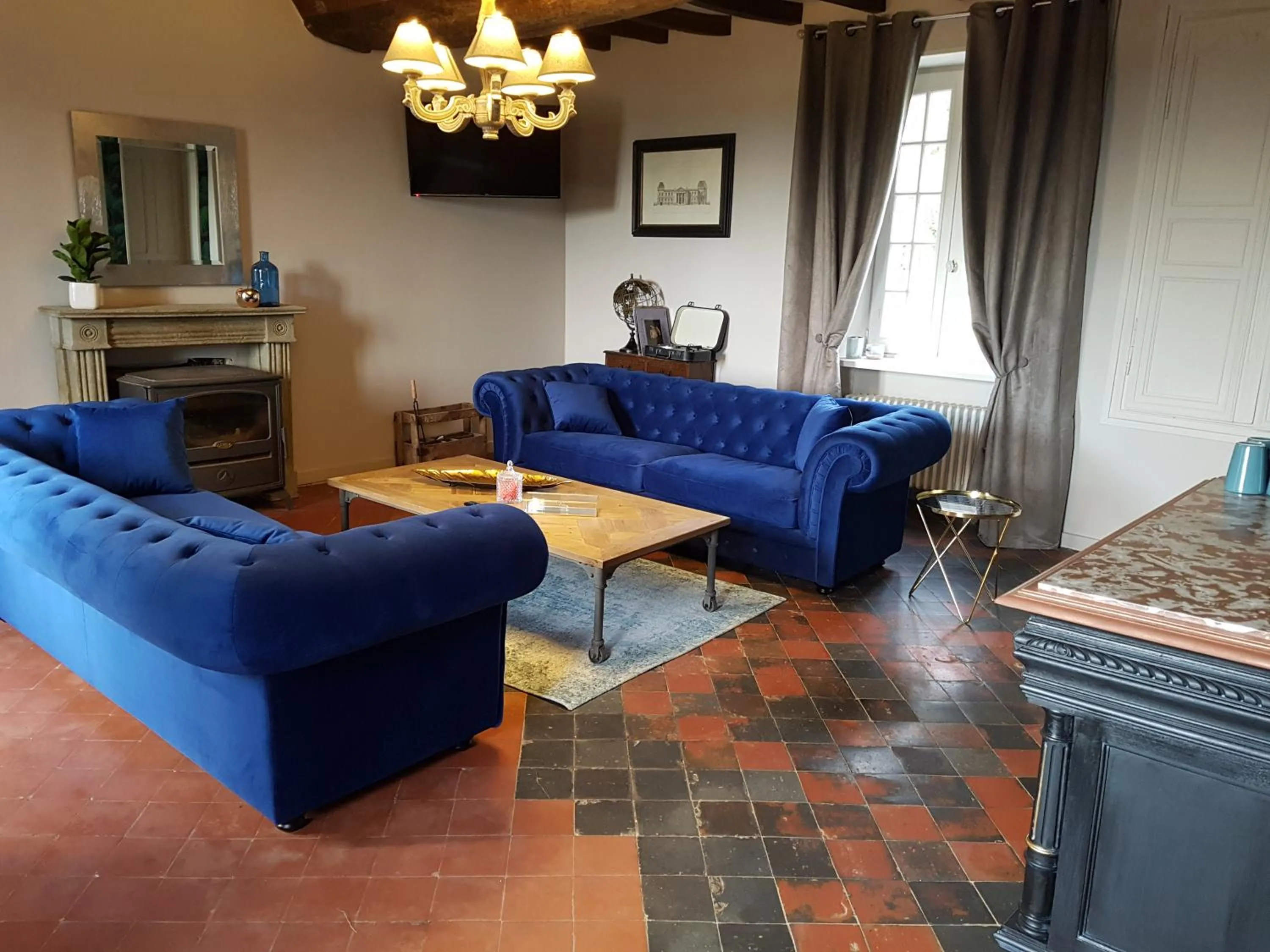 Communal lounge/ TV room in Domaine de la Fauvriere