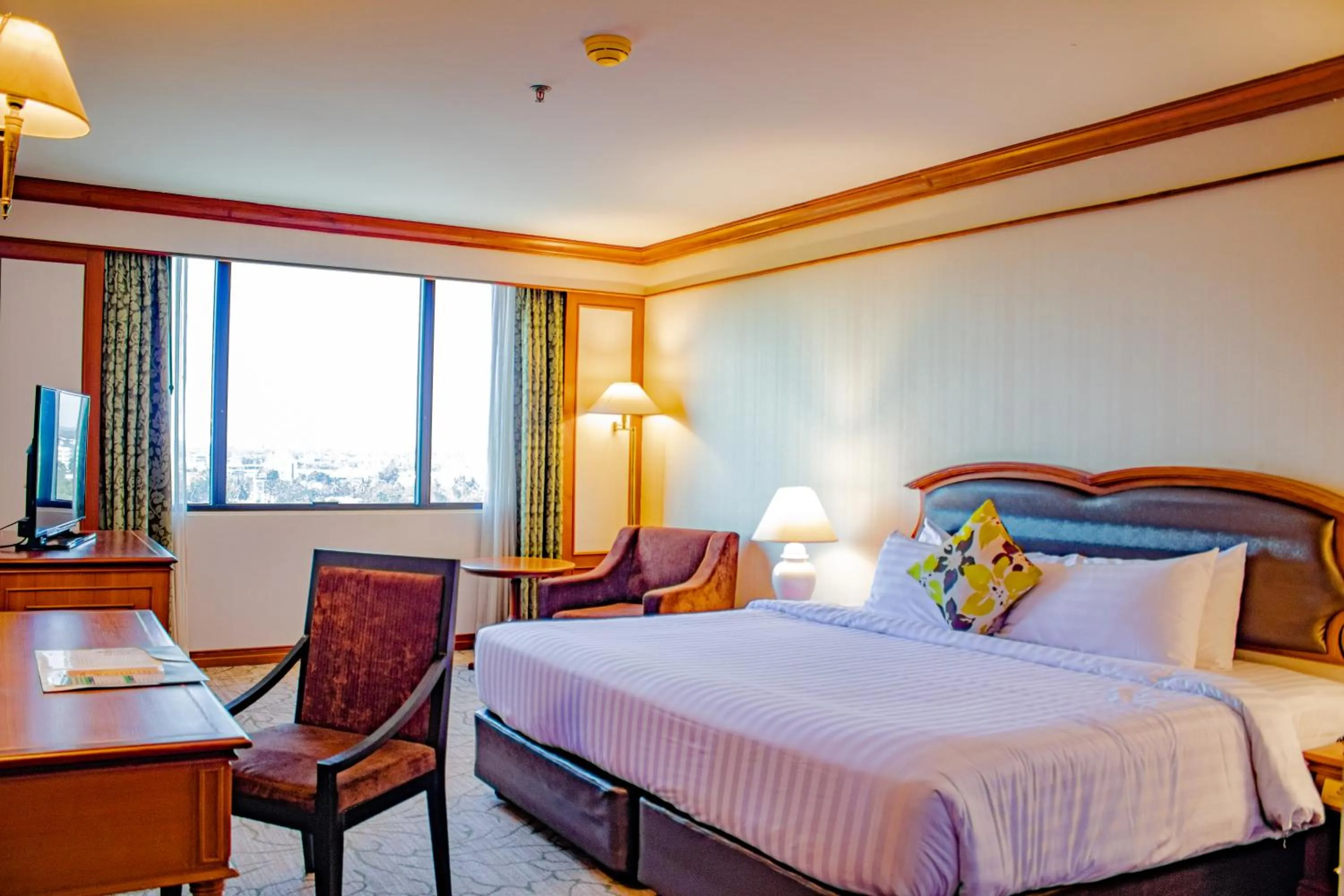 Bed in The Twin Lotus Hotel