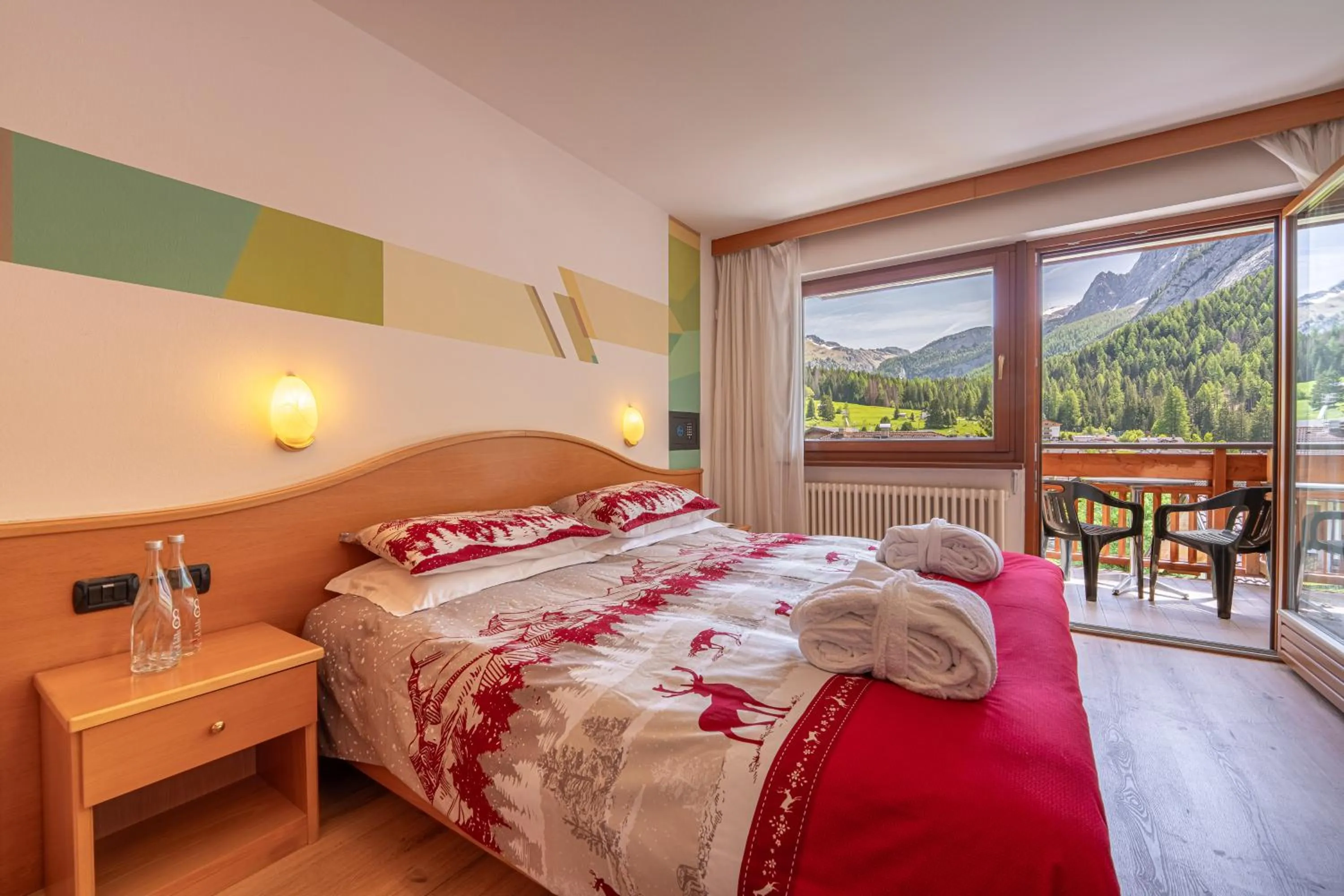 Bedroom, Bed in Hotel Dolomites Inn