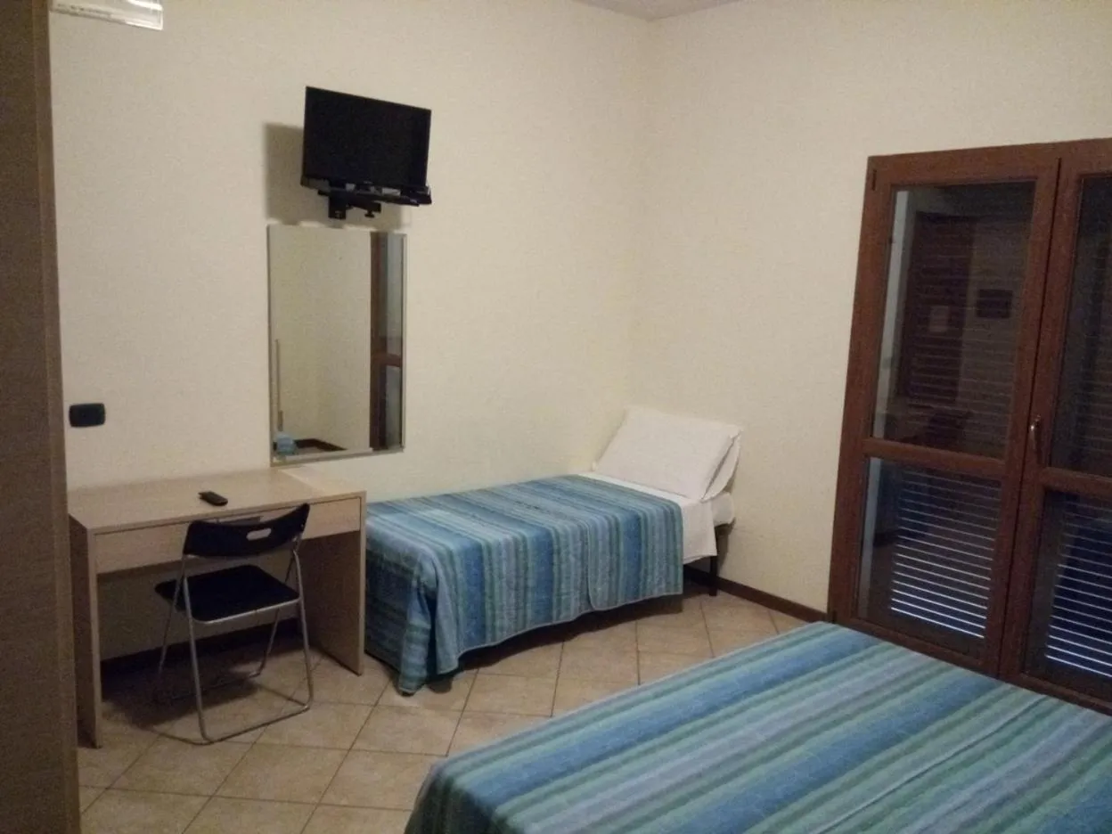 Bed in Hotel Magnolia