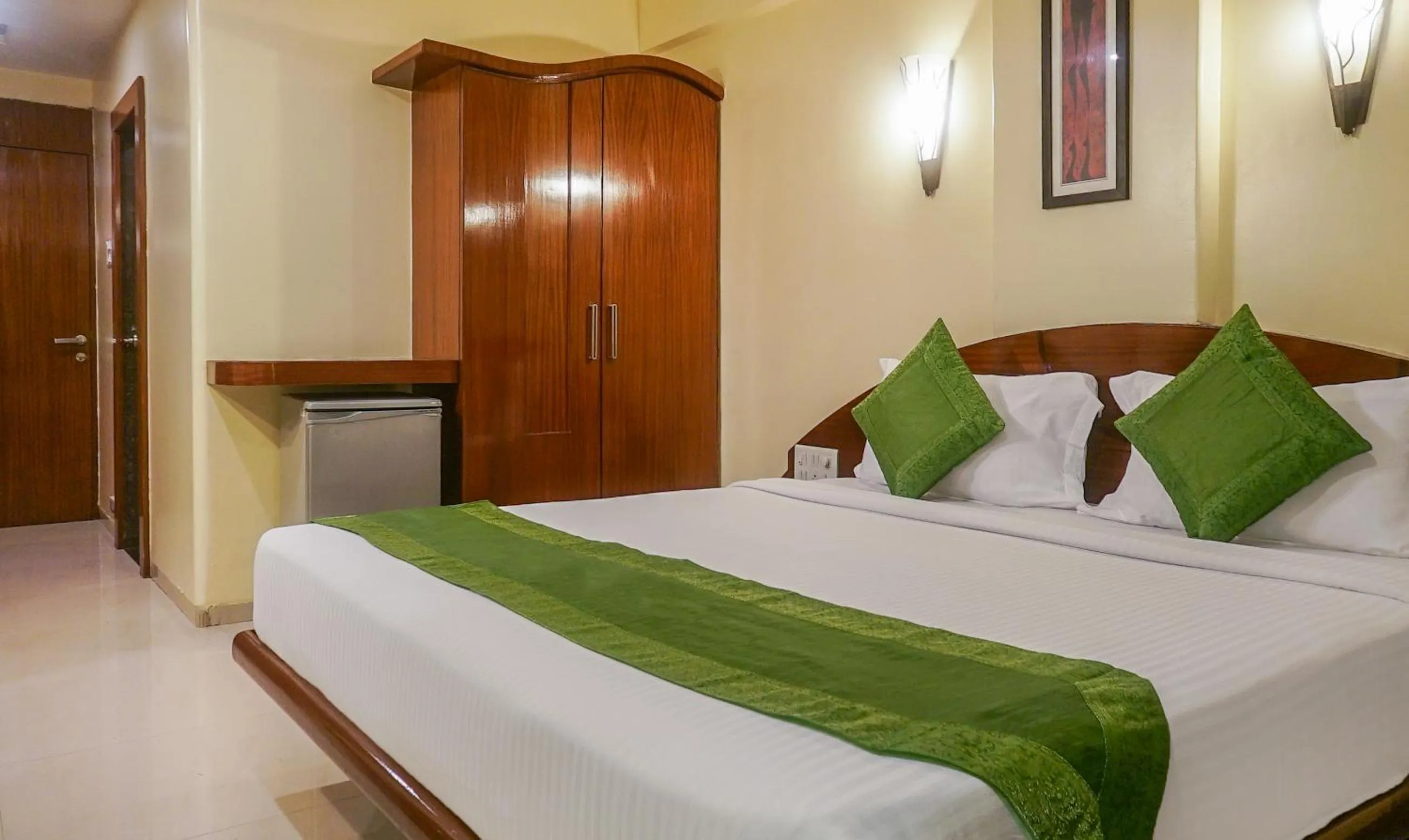 Bed in Treebo Brahma Regency