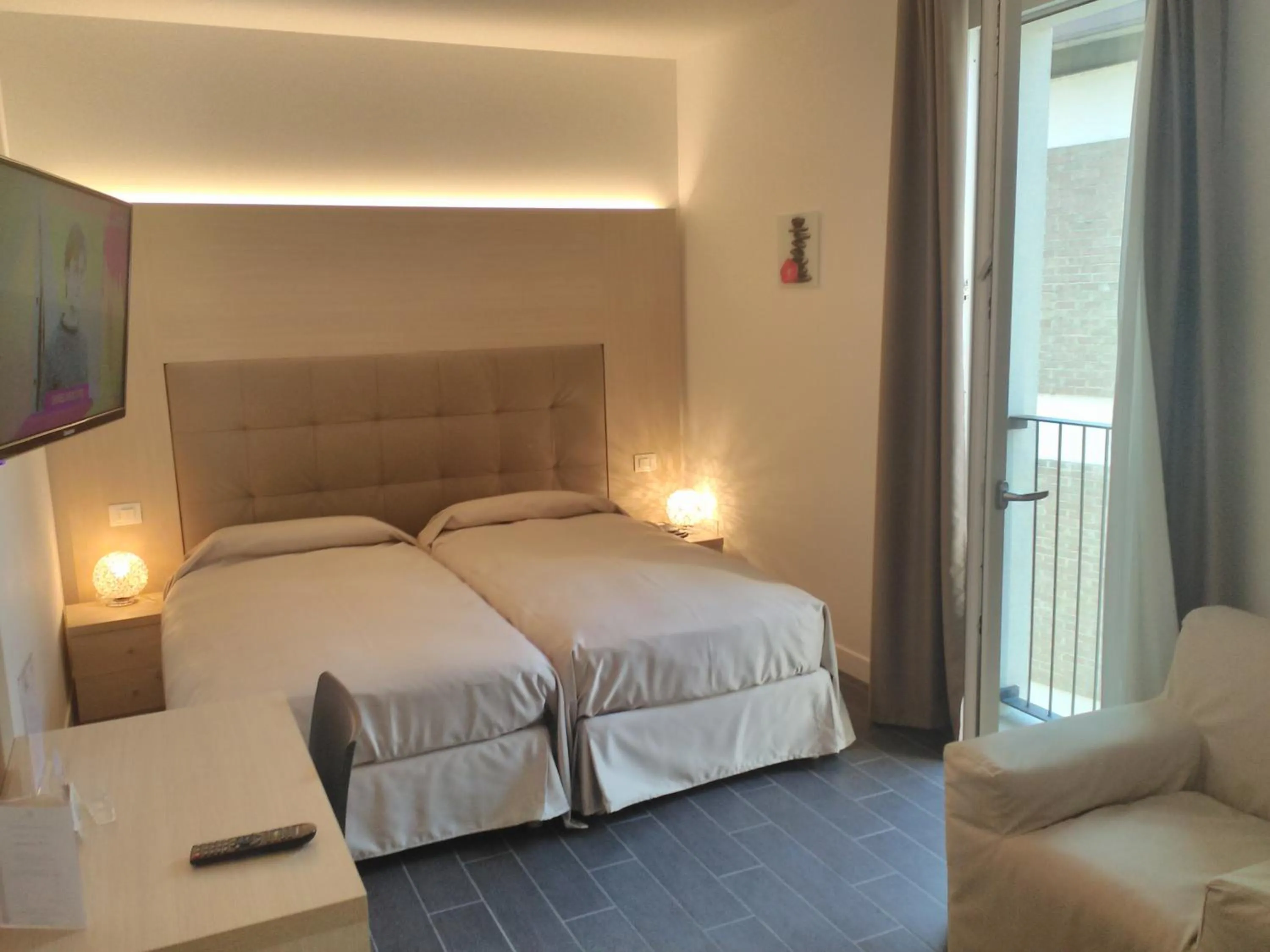 Bed in Hotel Orchidea