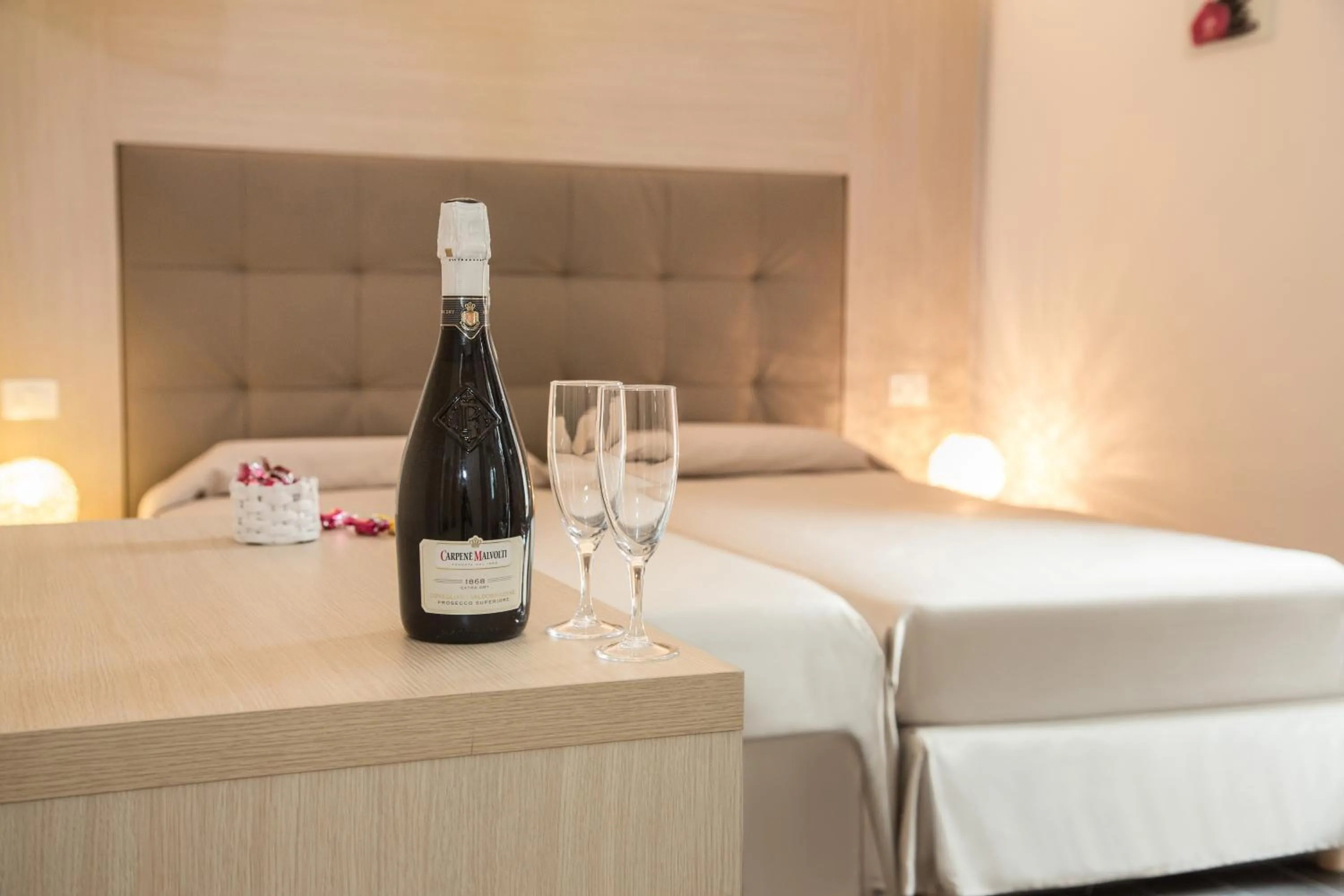 Bed in Hotel Orchidea