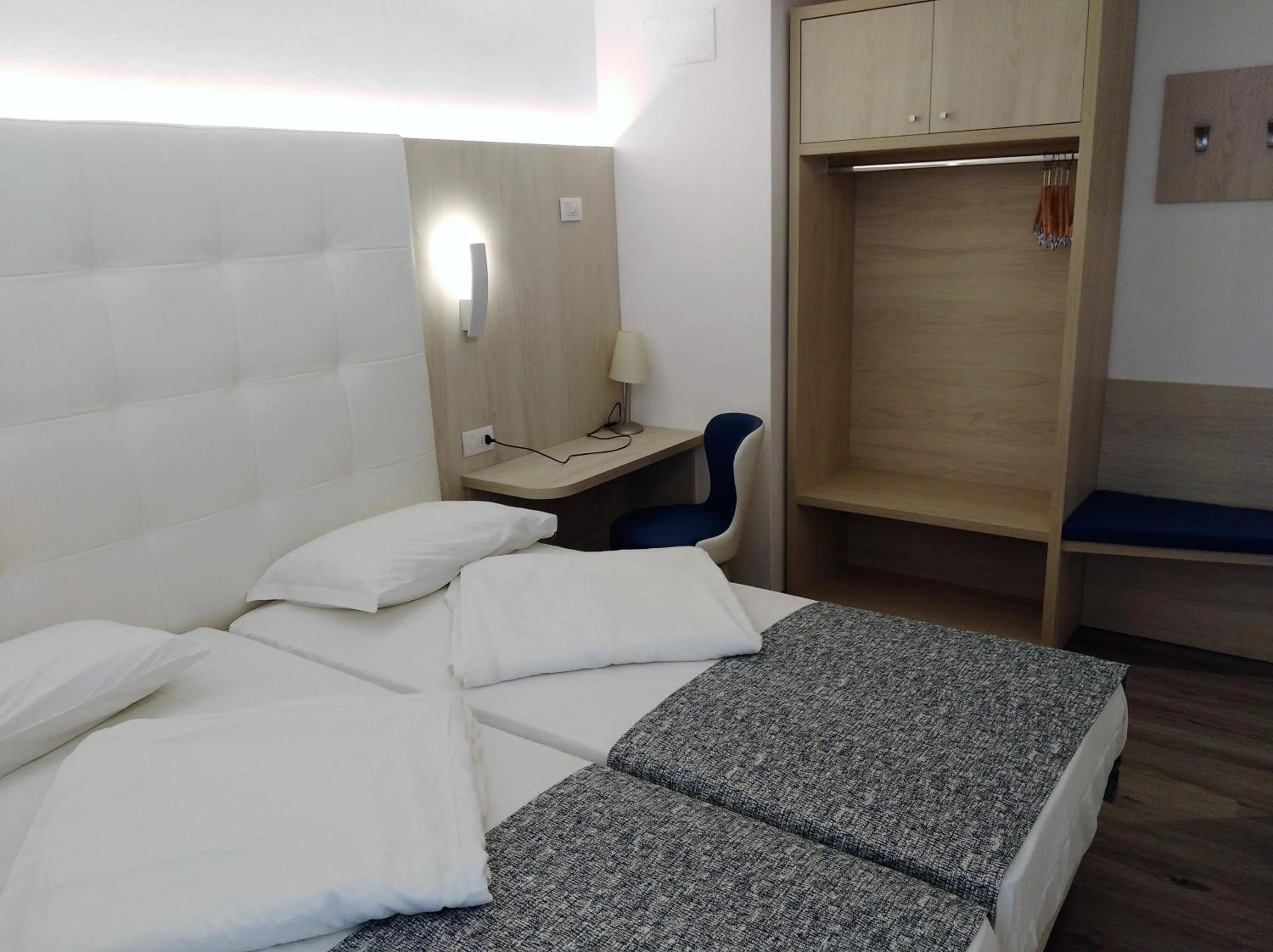 Bed in Hotel Orchidea