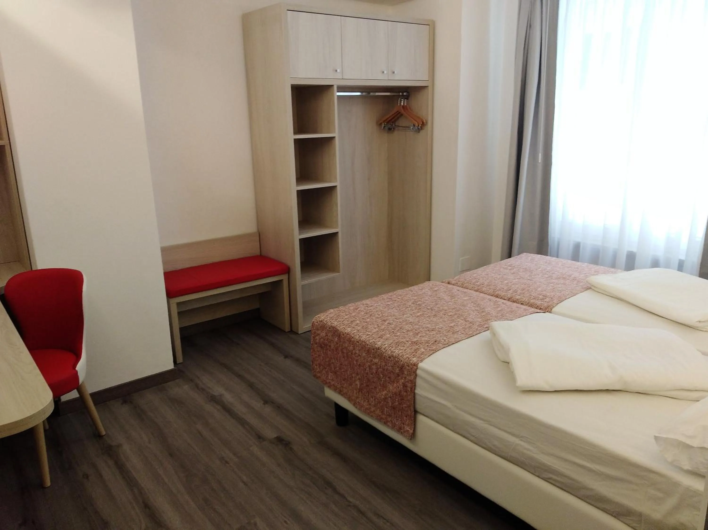 Bed in Hotel Orchidea