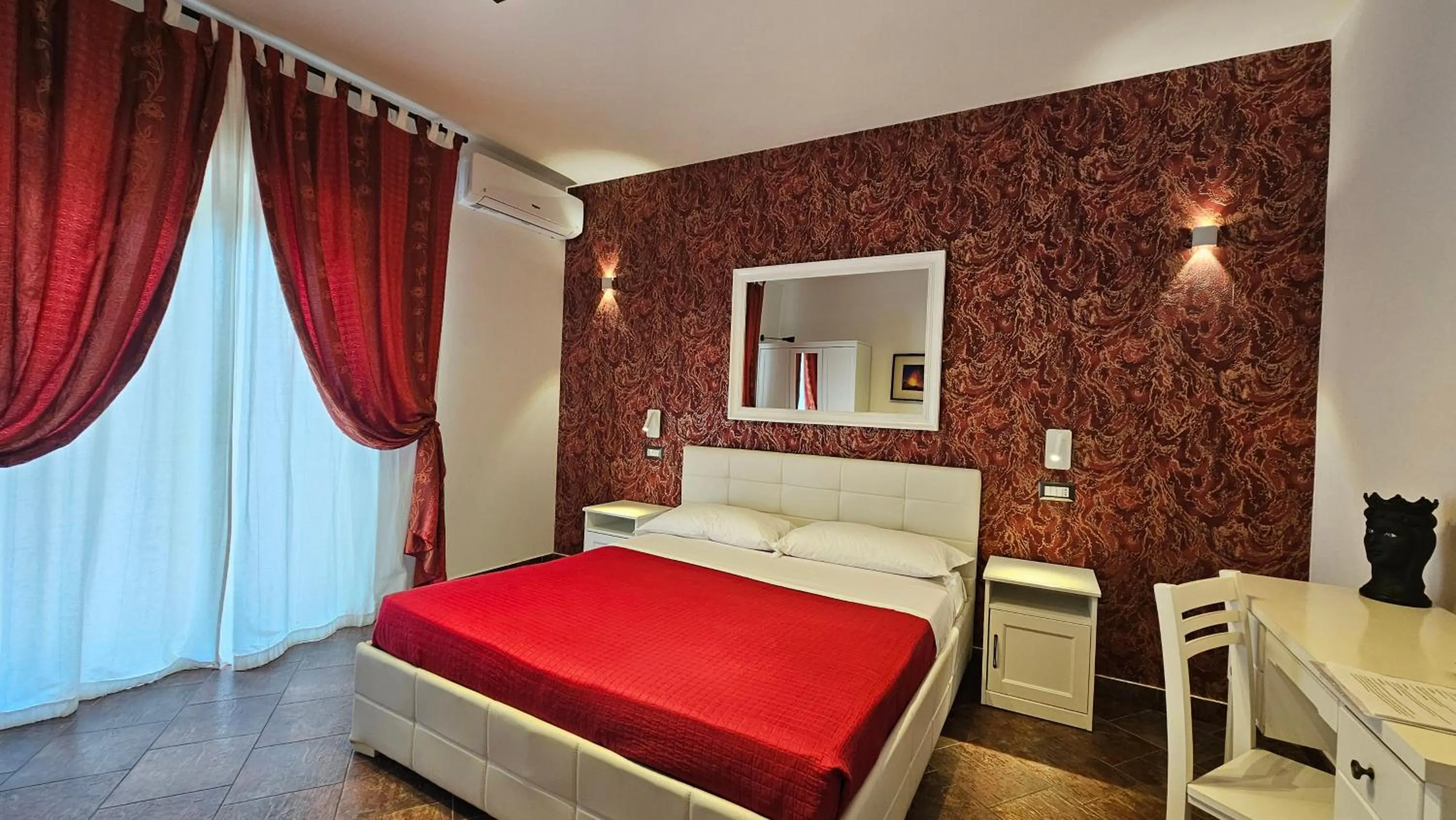 Bed in B&B Triskèles Adult Only