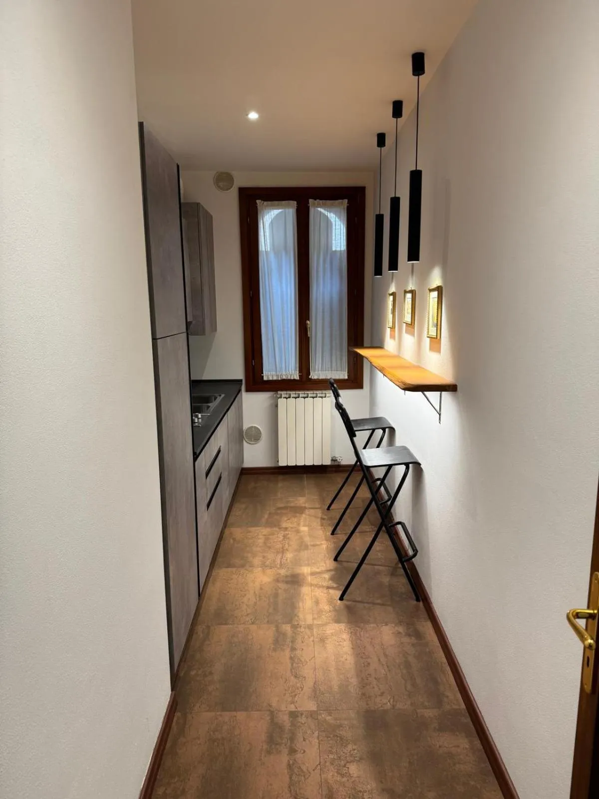 Kitchen or kitchenette in Hotel Guerrato