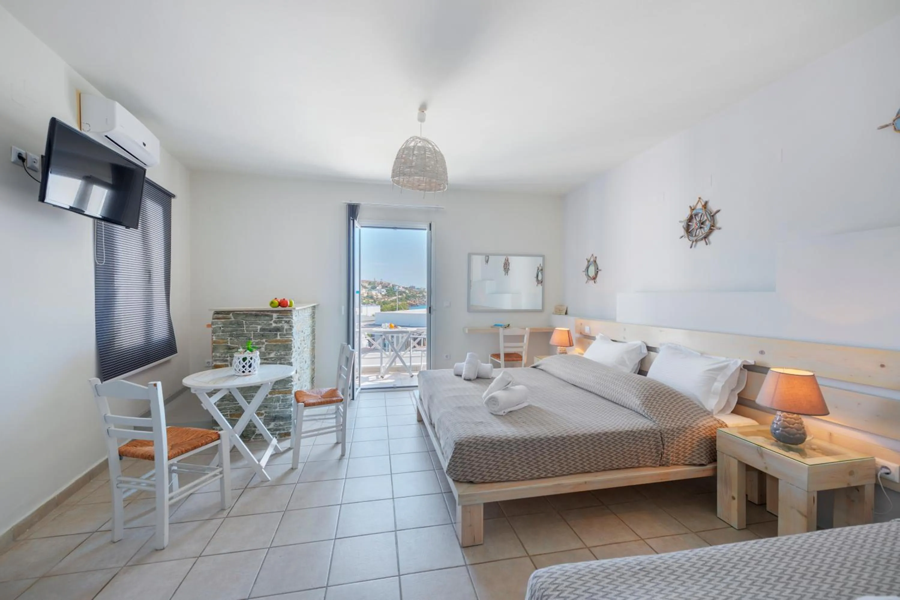 Communal lounge/ TV room, Bed in Aegean Paradiso Vacation Club - "Adults Only"