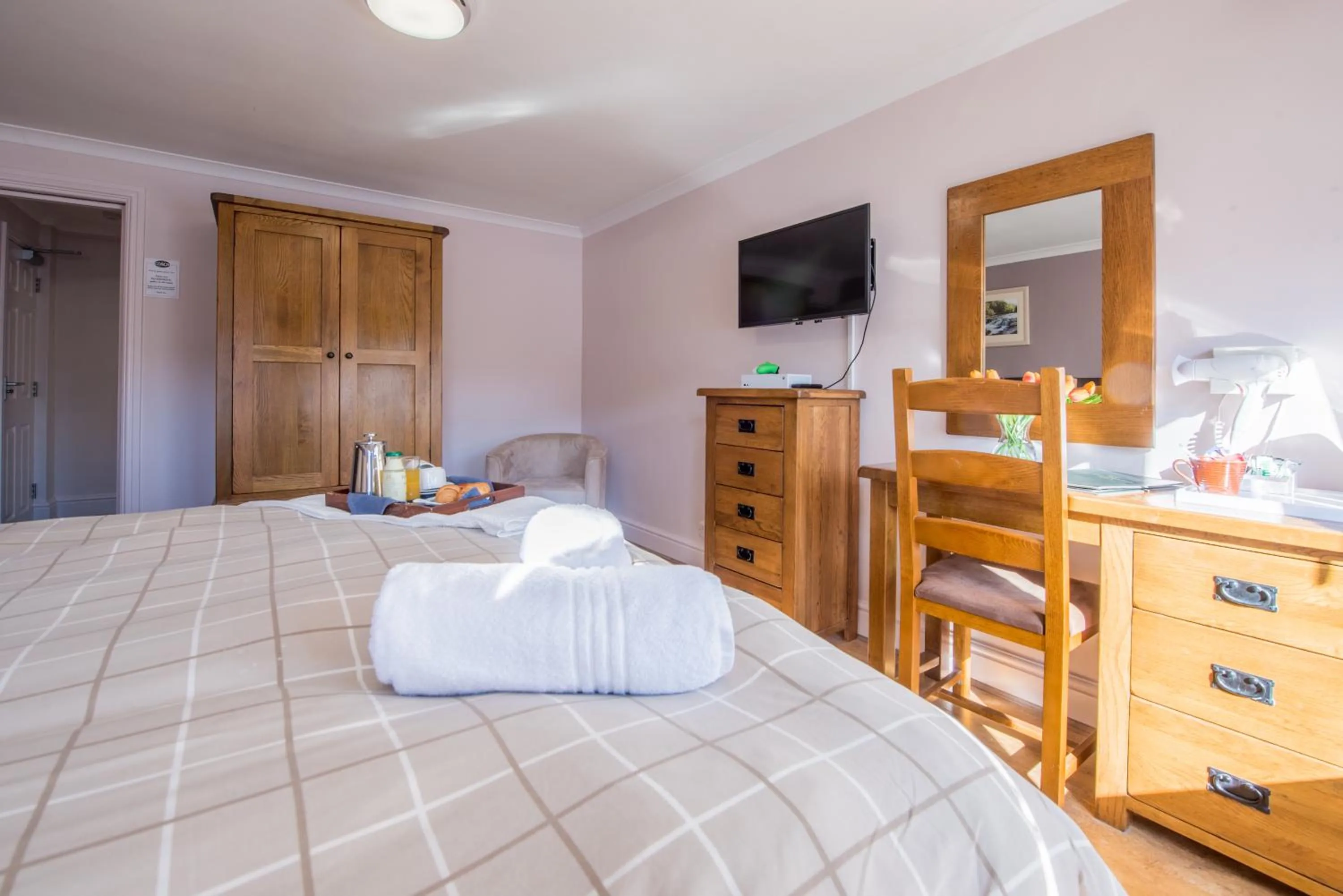 Bed in The Coach House Hotel