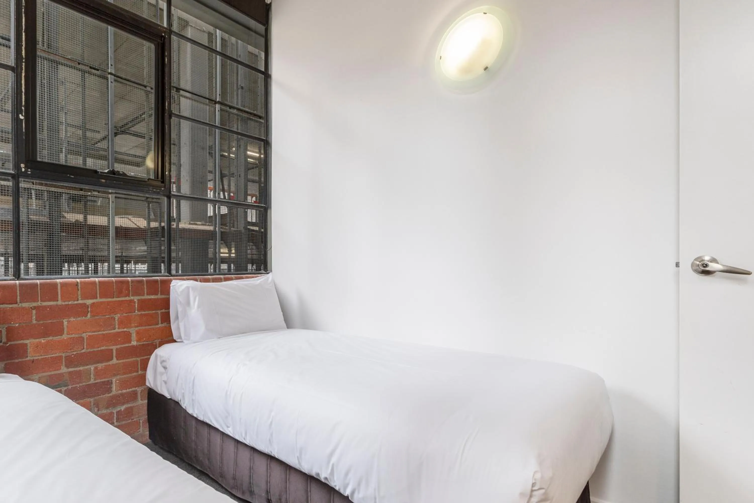 Bed in Punthill Apartment Hotel - Manhattan