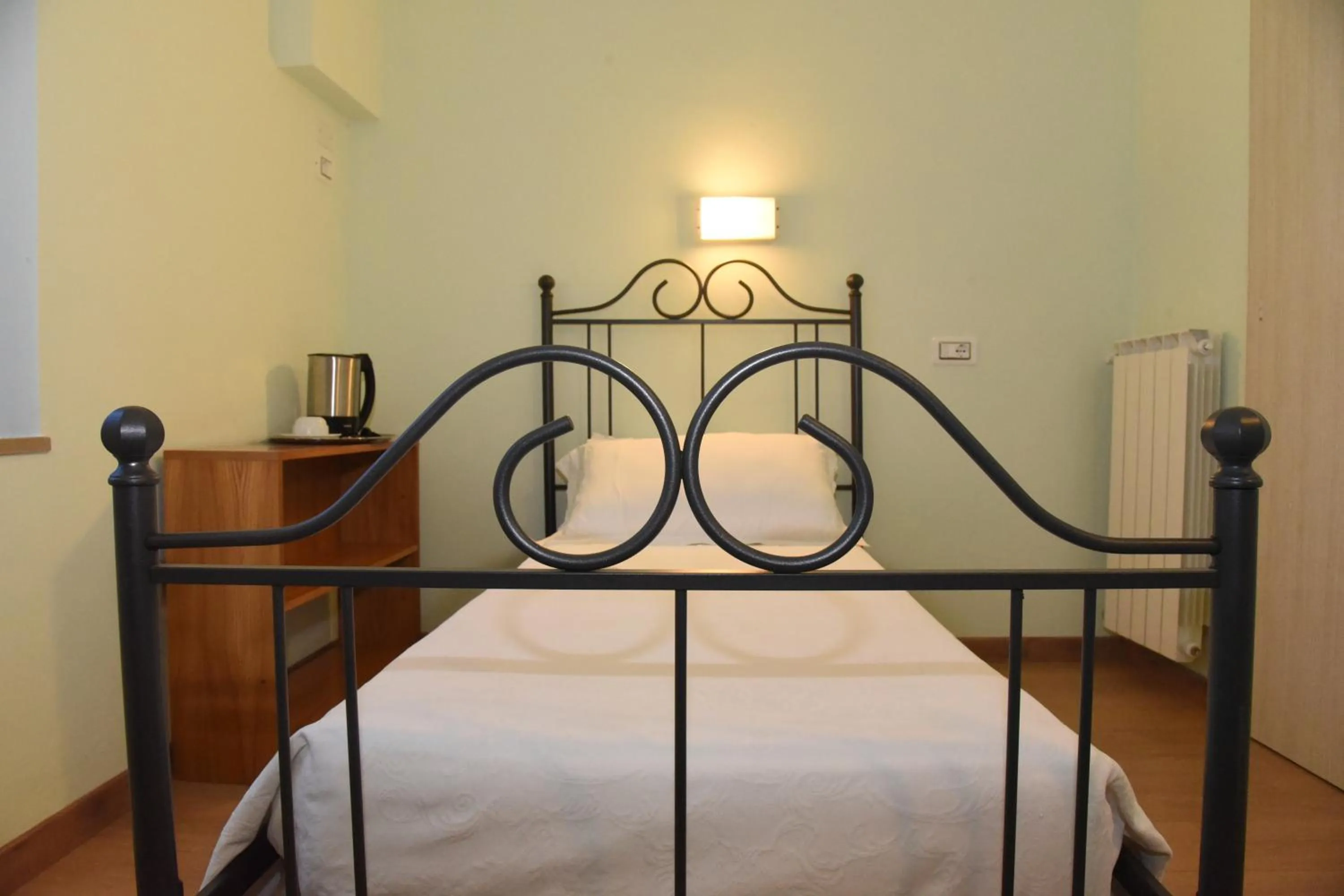 Bed in Albergo La Rosetta
