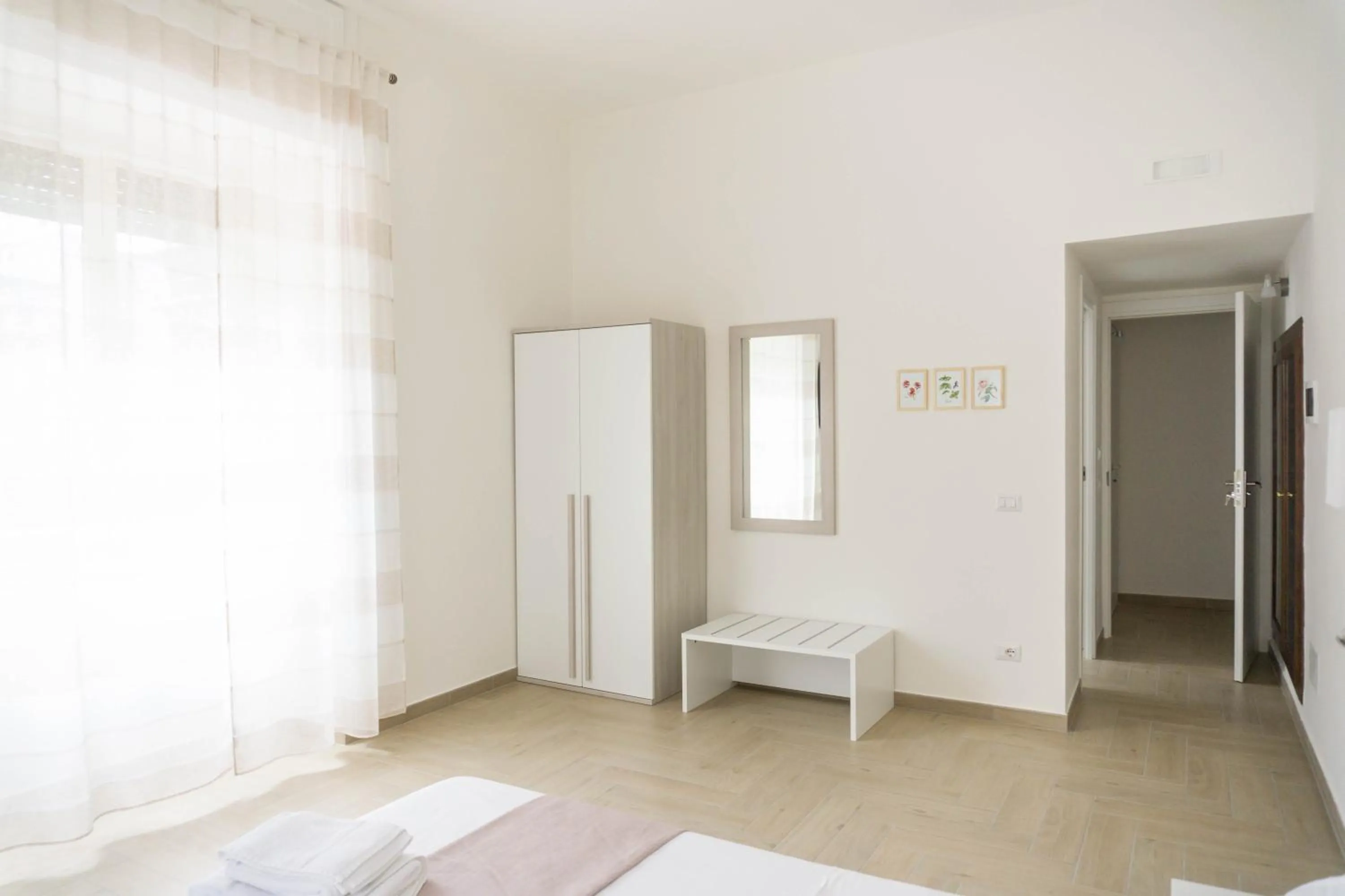 Living room, Bed in Le Stanze della Regina