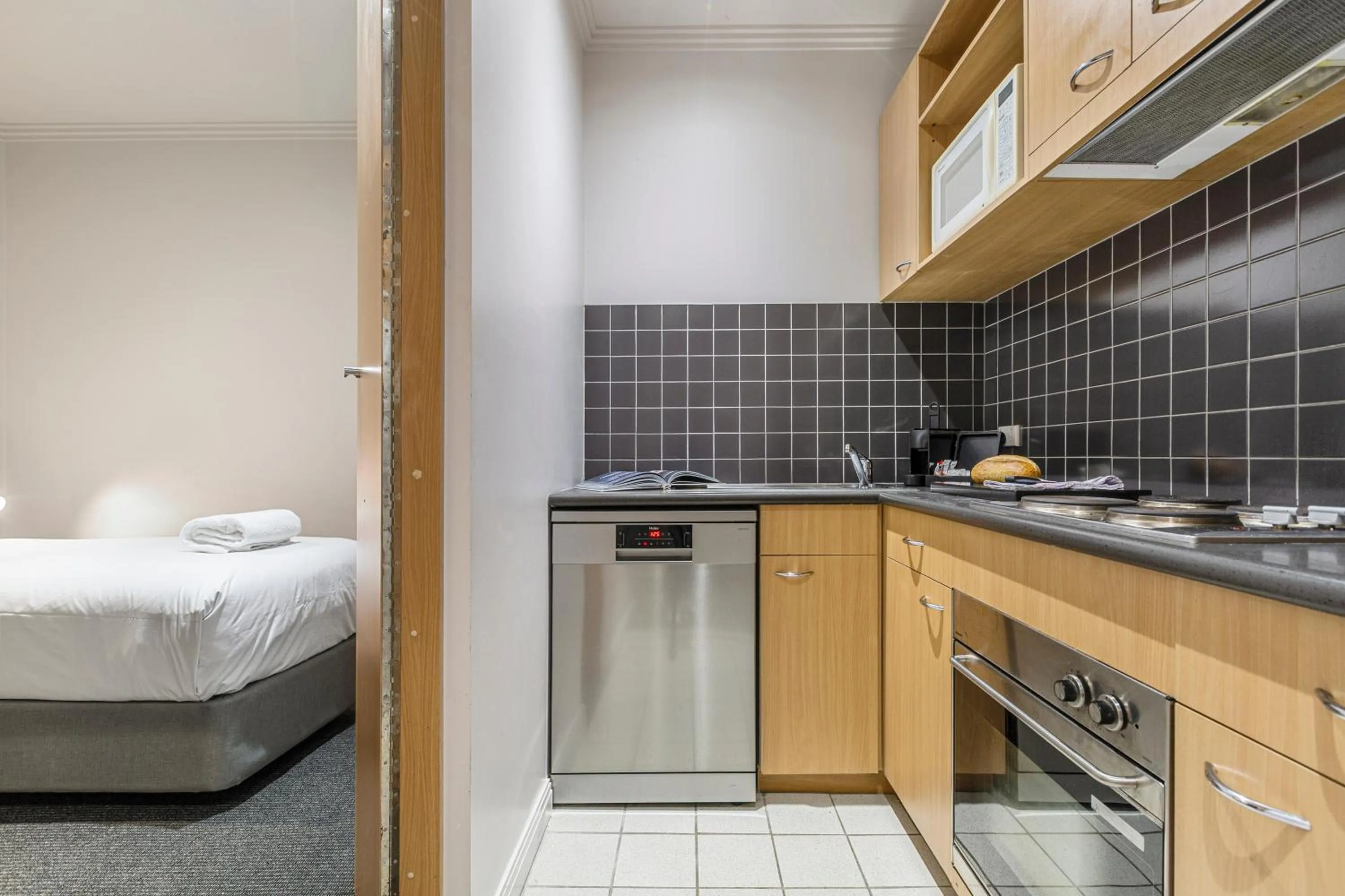 dishwasher, Bed in Punthill Apartment Hotel - Flinders Lane