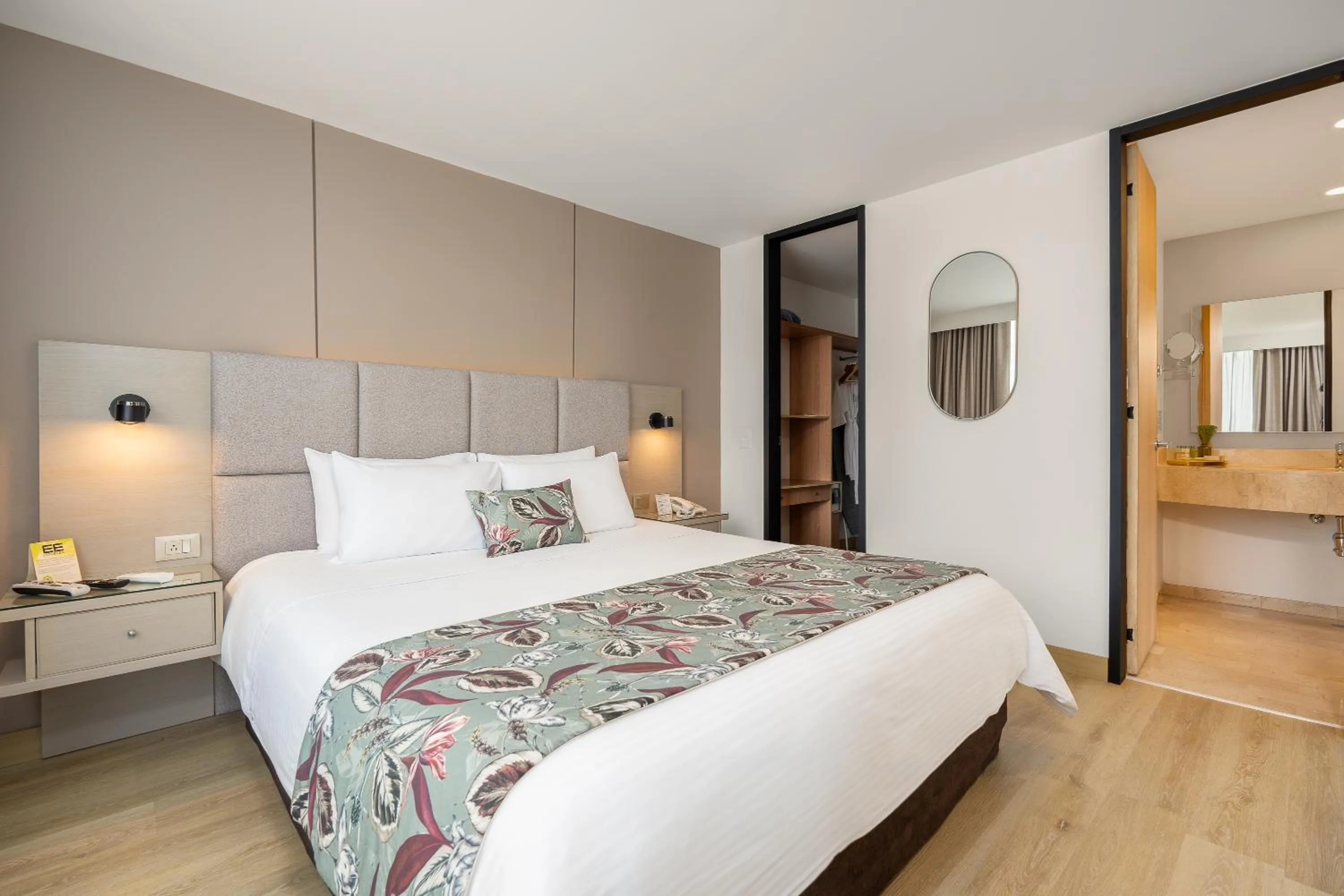 Bed in Novelty Suites Hotel - Oviedo Mall