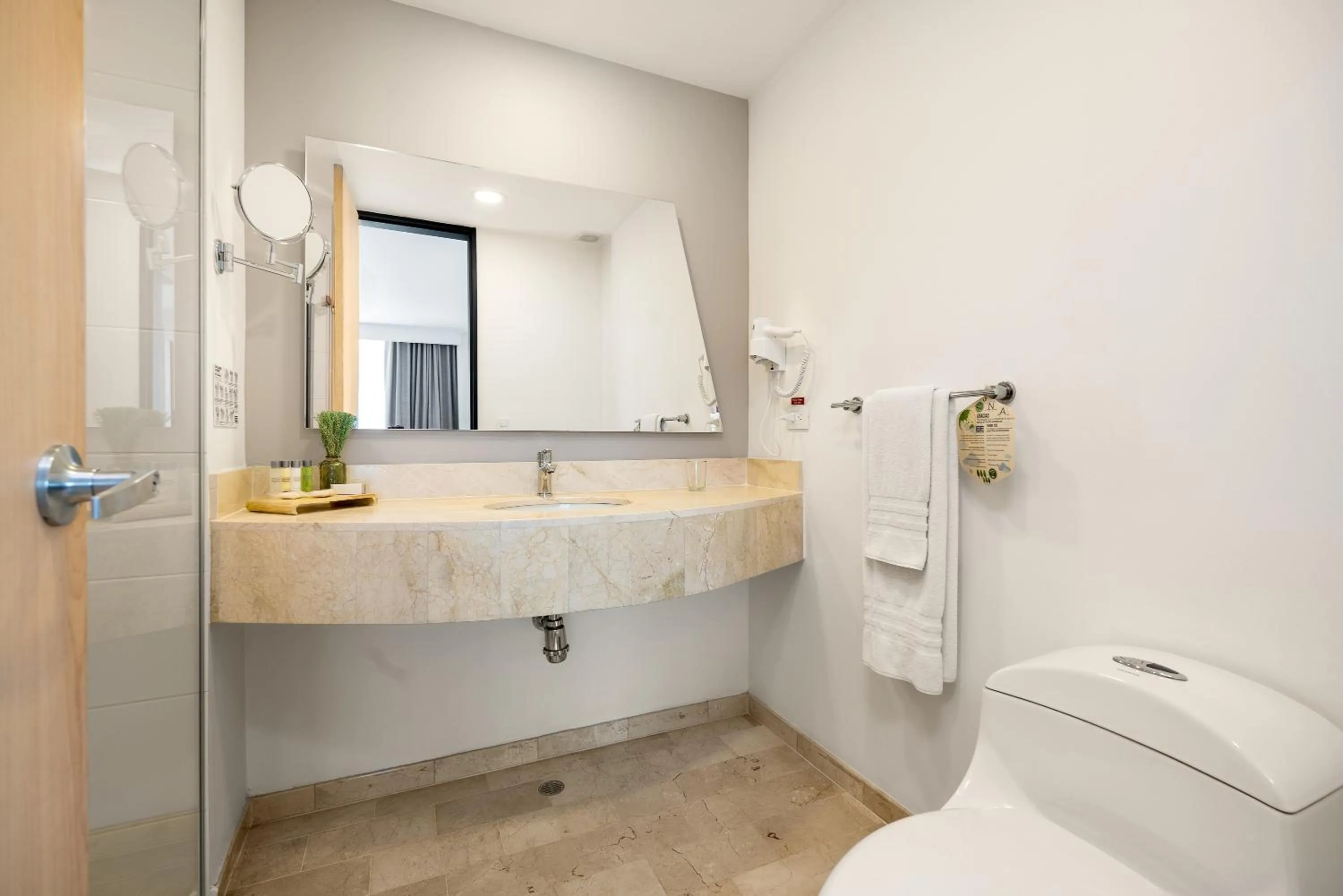 Bathroom in Novelty Suites Hotel - Oviedo Mall