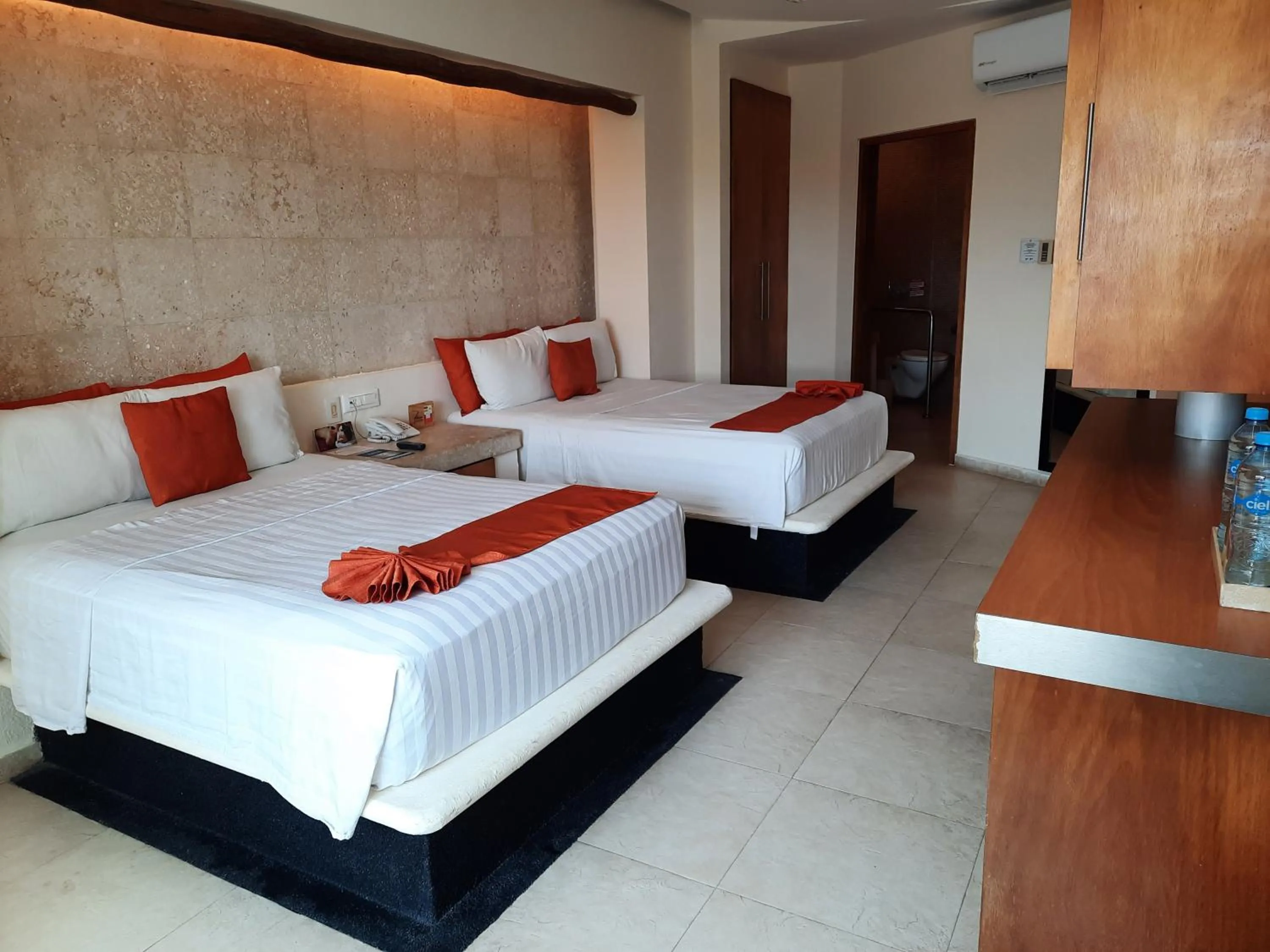 Bed in Artisan Playa Esmeralda Family Beach Hotel