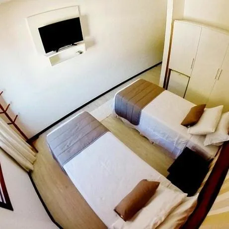 Bed in Pousada Porto dos Milagres