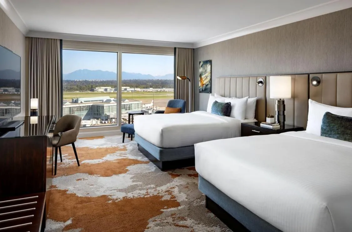 Bed in Fairmont Vancouver Airport In-Terminal Hotel