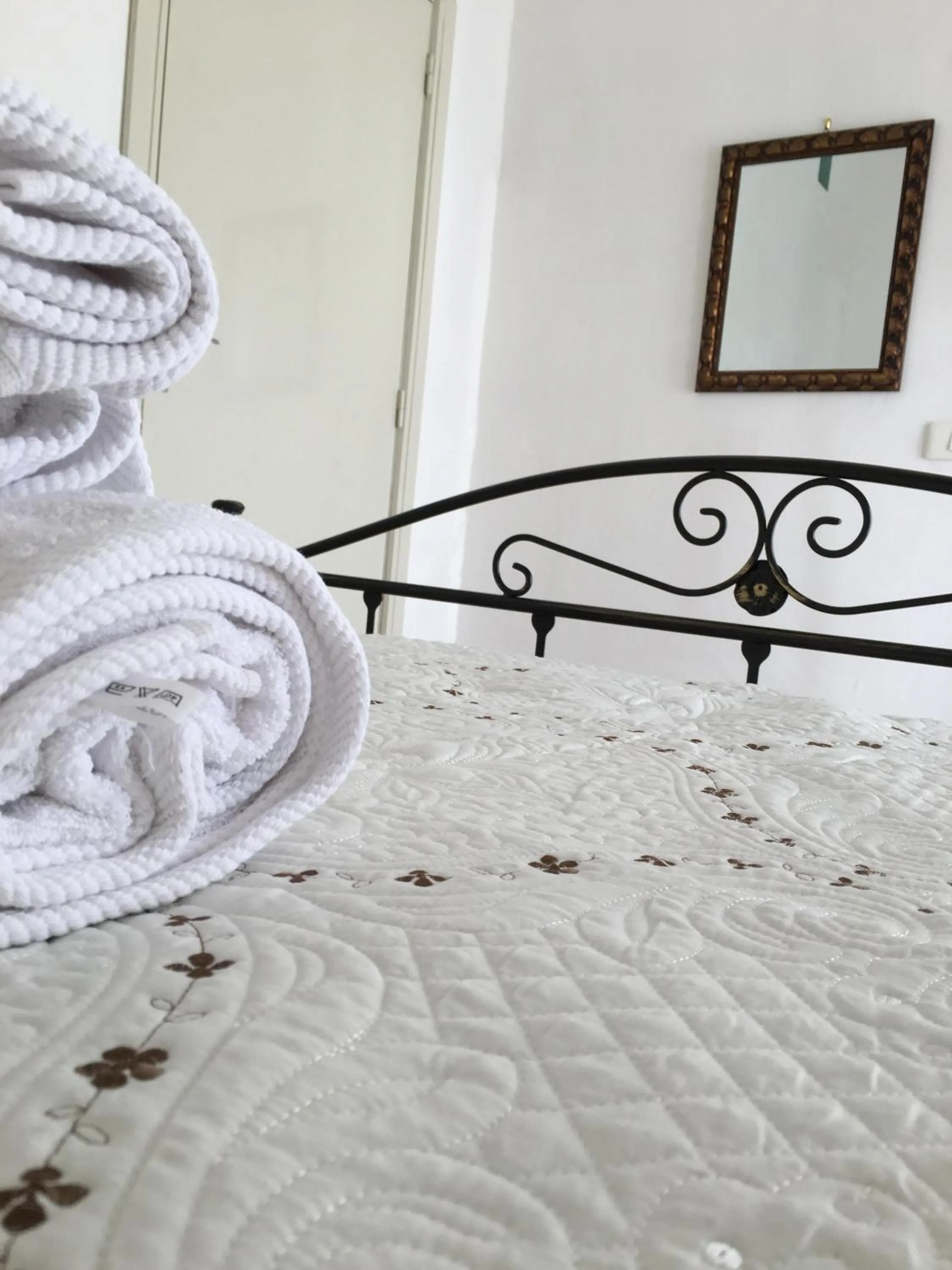 Bed in Gocce Siciliane Apartments