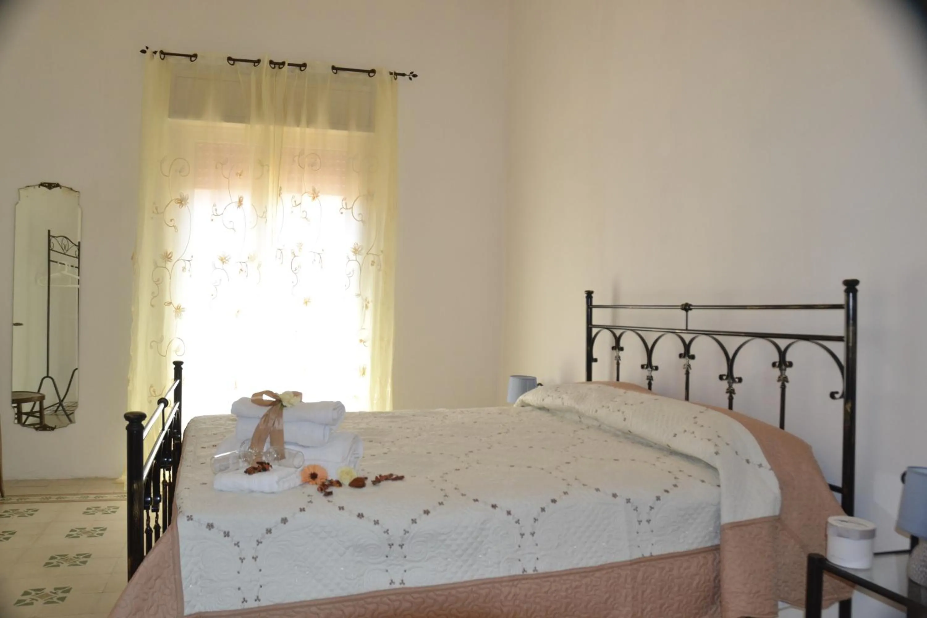 Bed in Gocce Siciliane Apartments