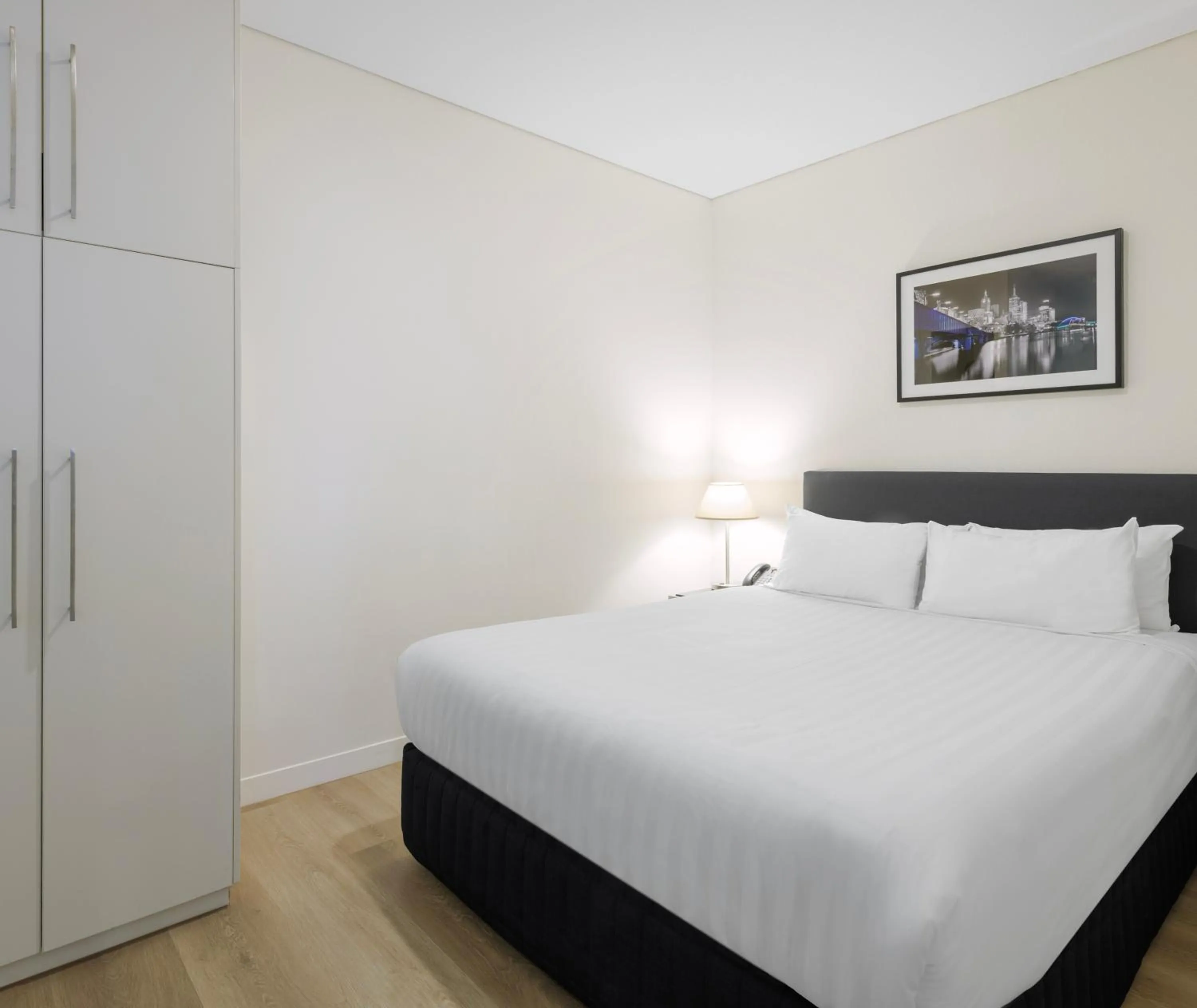 Bed in Oaks Melbourne on Collins Suites