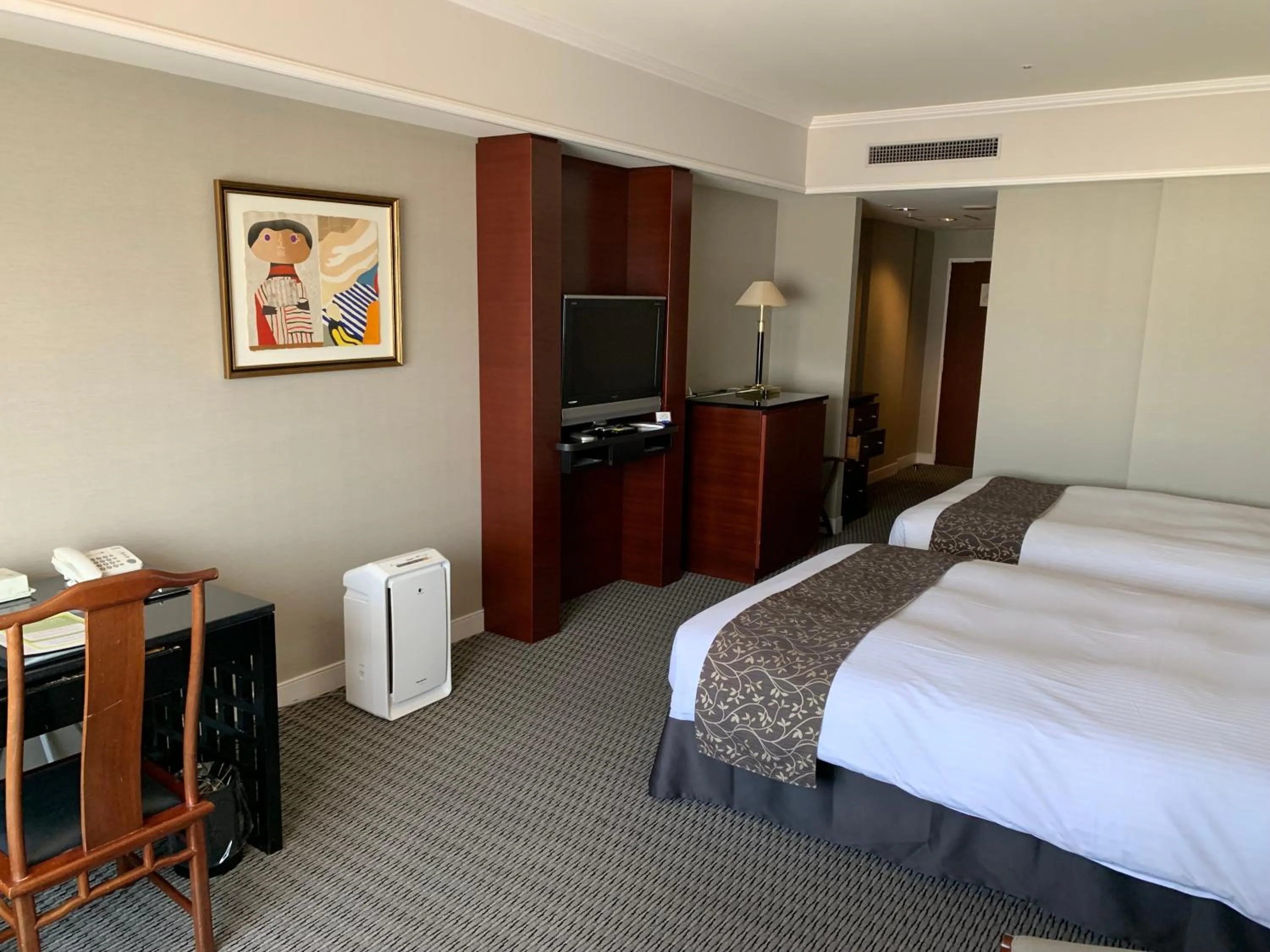 Bed in Kurashiki Royal Art Hotel