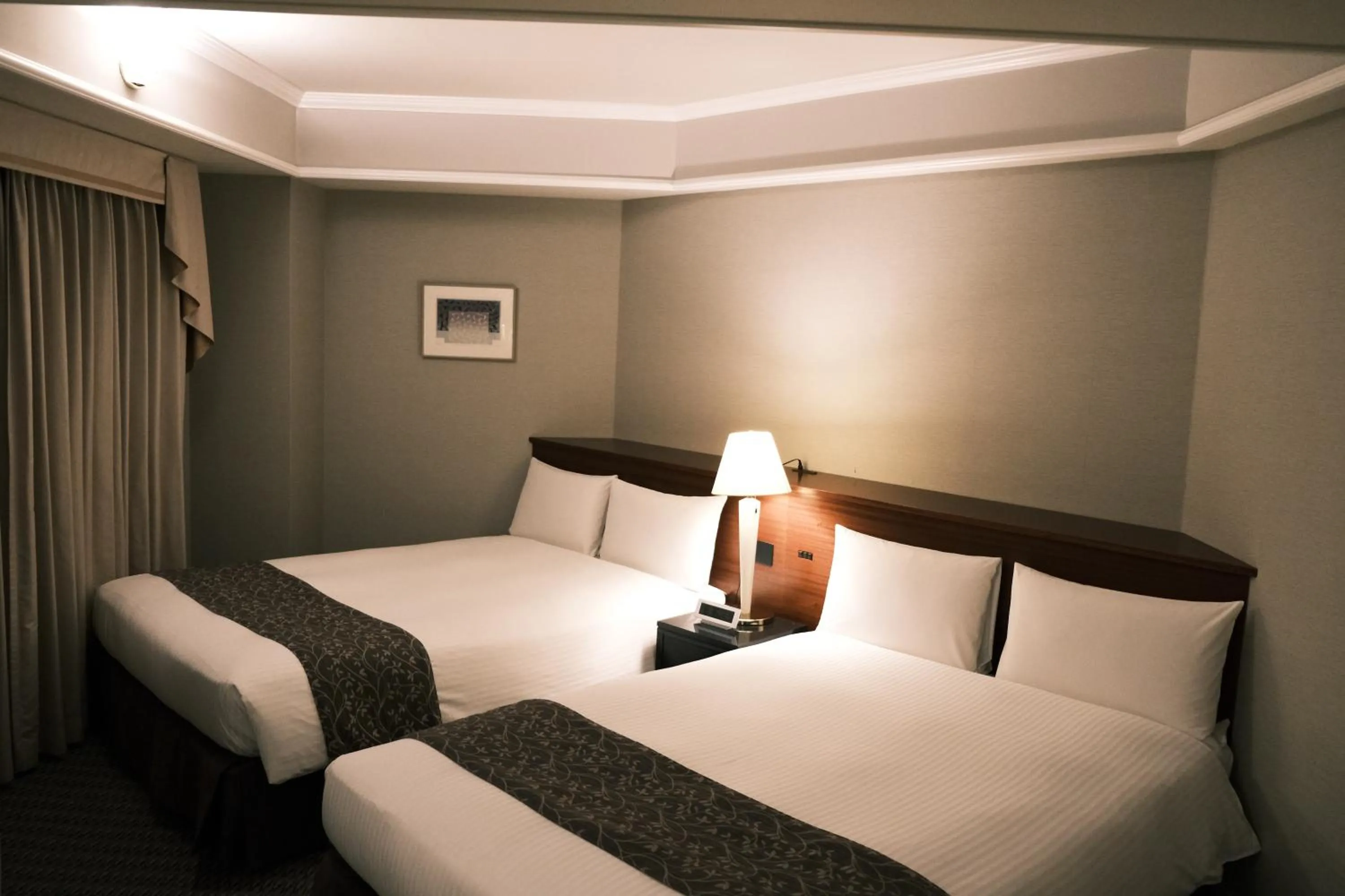 Bed in Kurashiki Royal Art Hotel