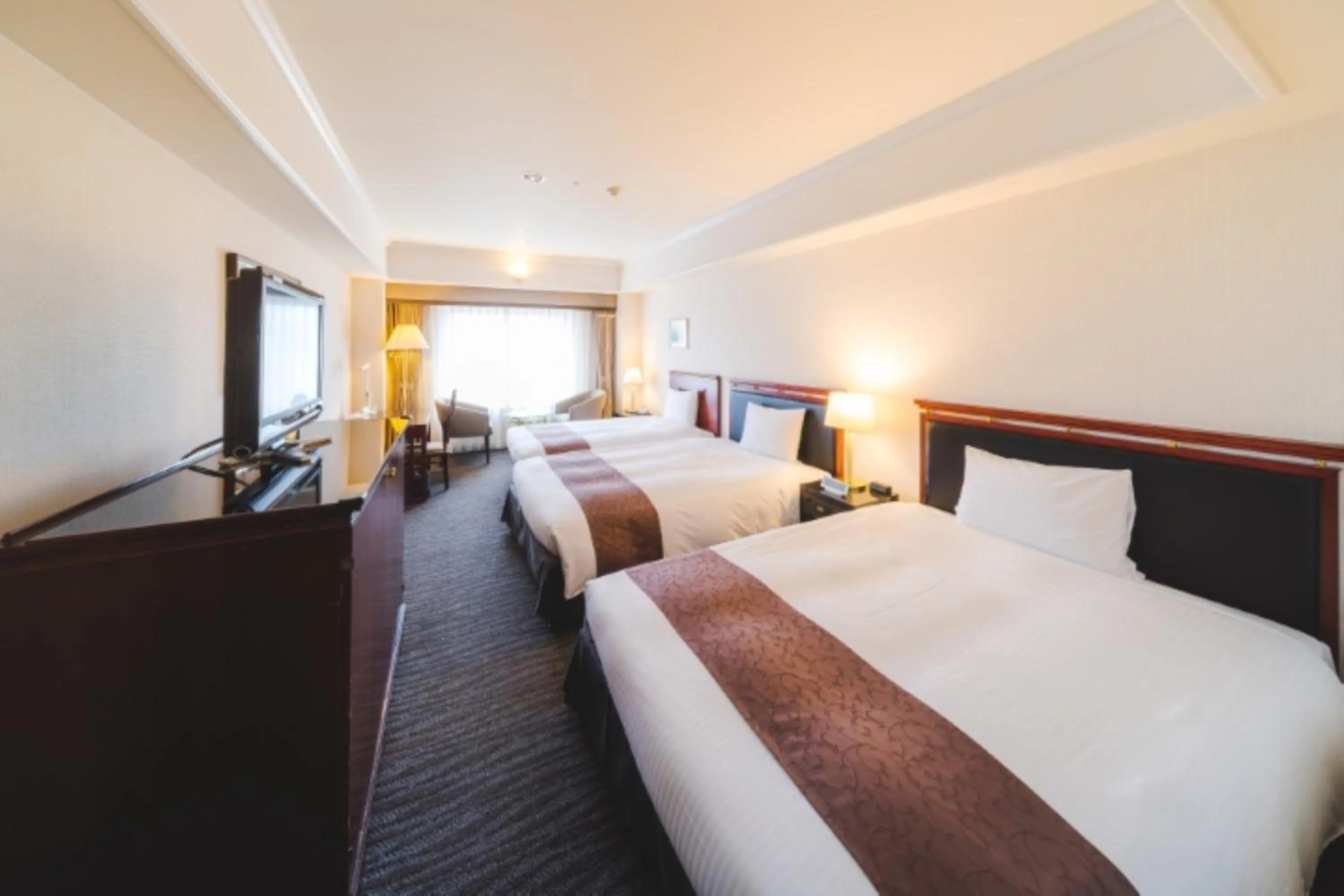 Bed in Kurashiki Royal Art Hotel