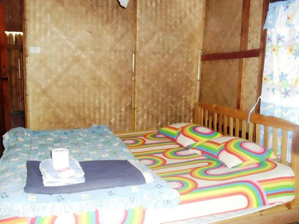 Bed in Family Hut Pai