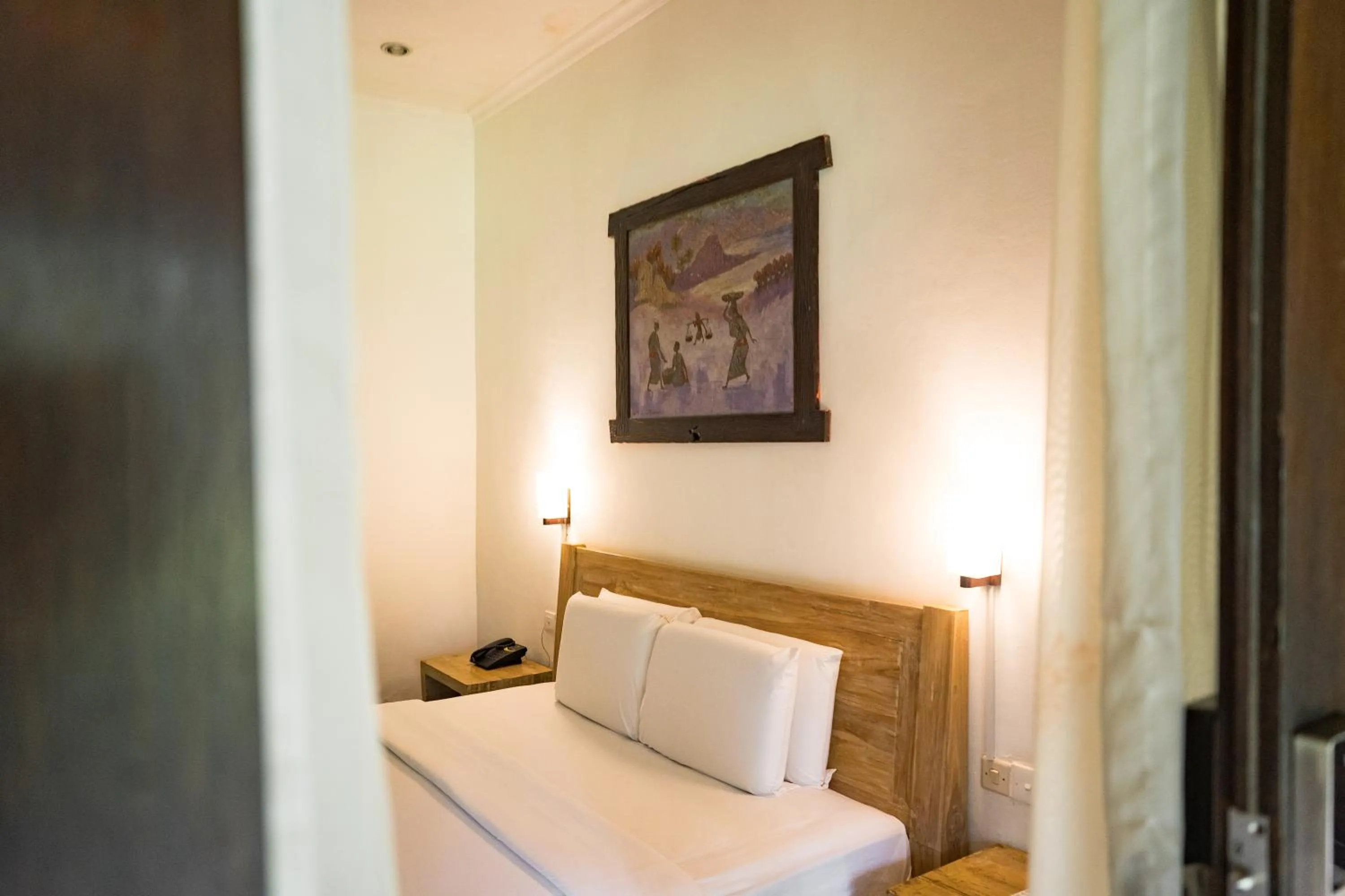 Bed in Royal Regantris Villa Karang