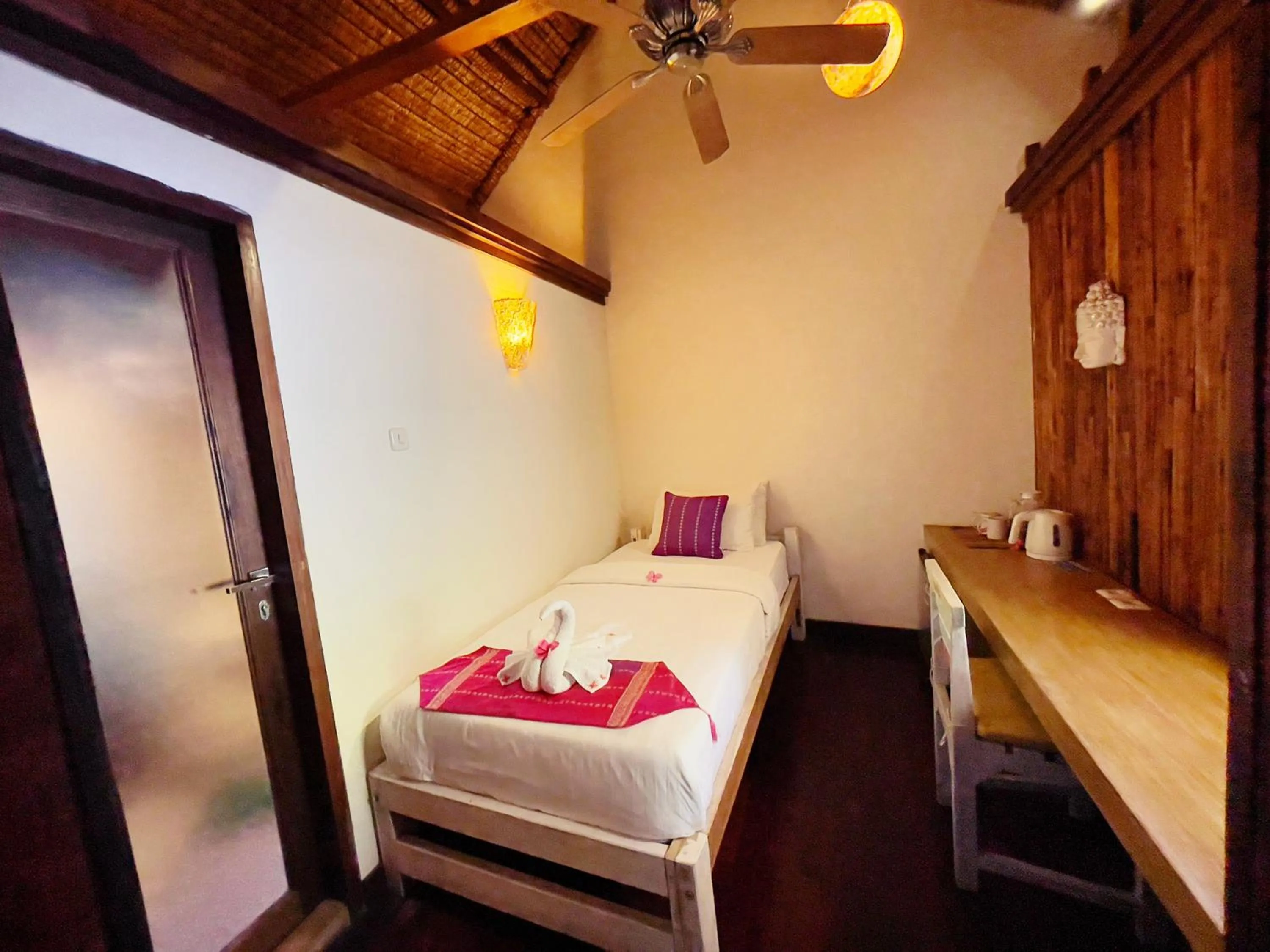 Bed in Samba Villas Beachfront View