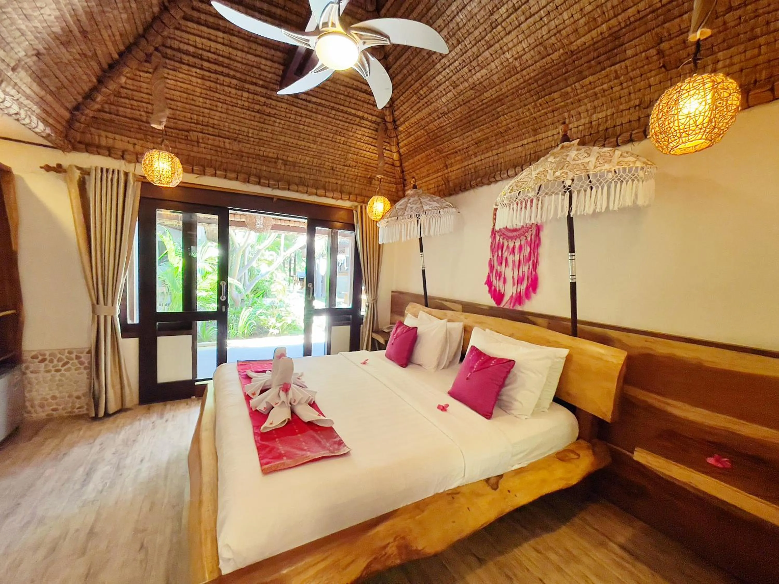 Bed in Samba Villas Beachfront View