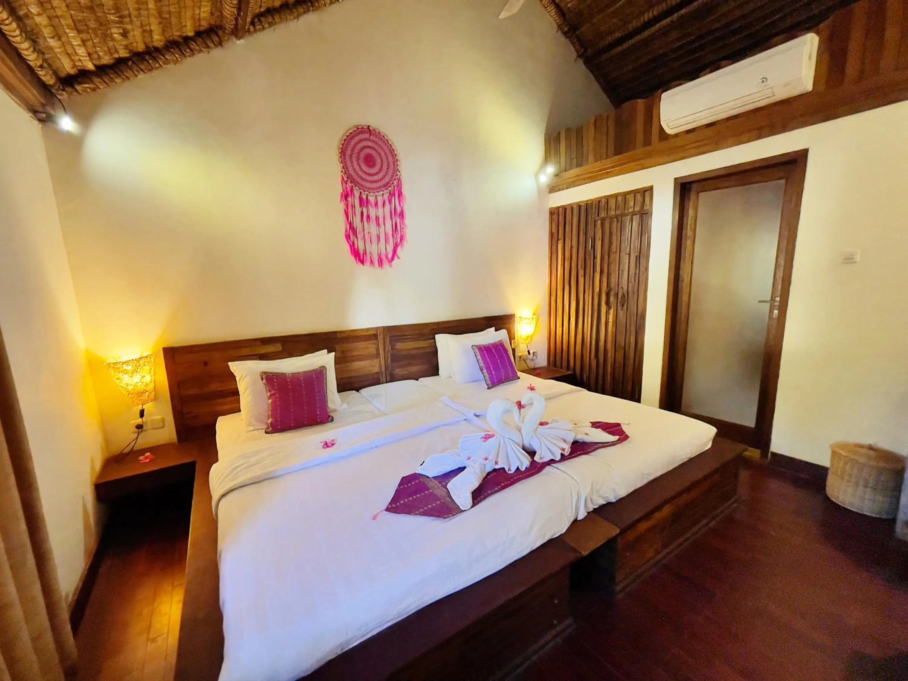 Bed in Samba Villas Beachfront View