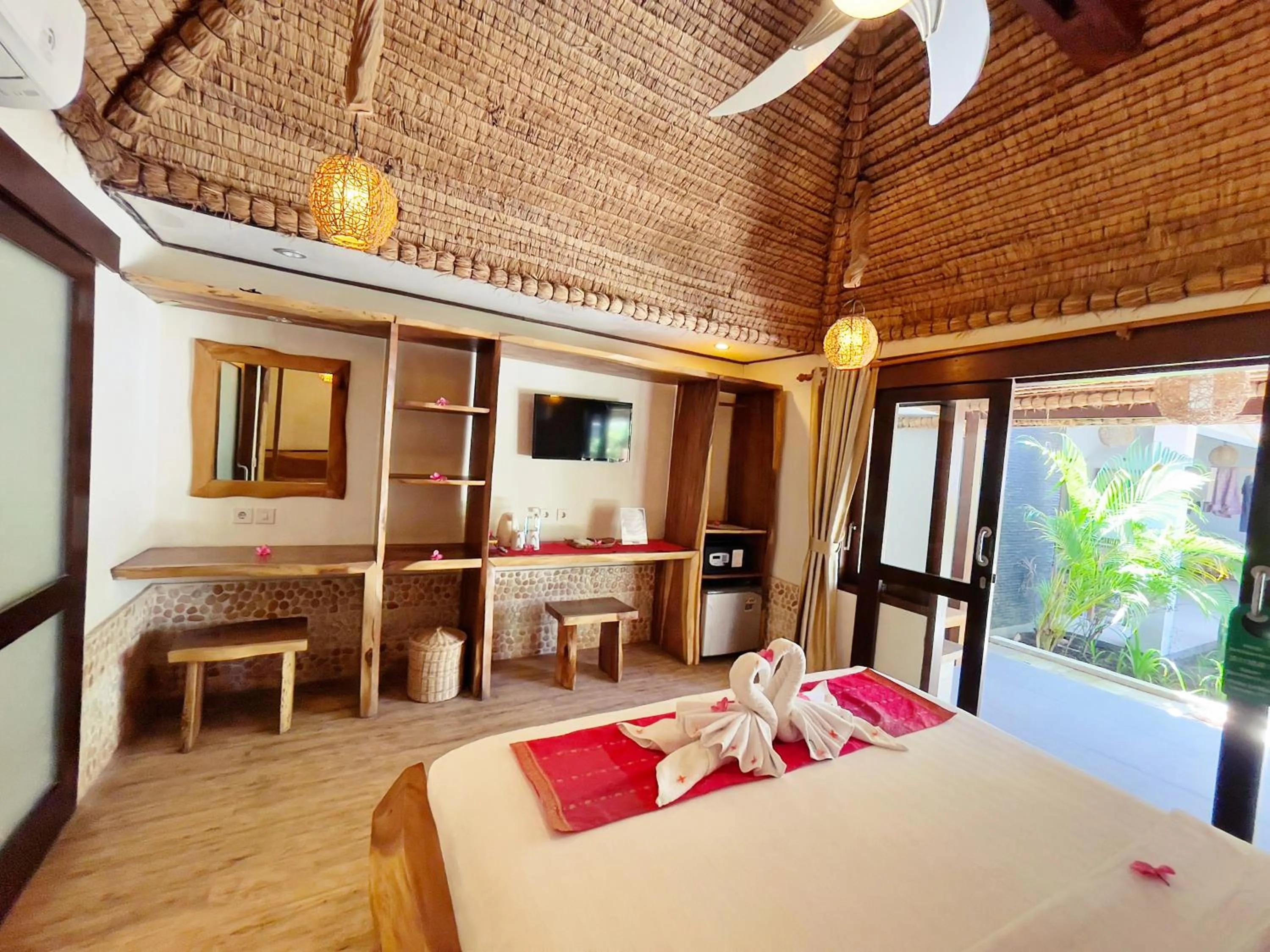 Bed in Samba Villas Beachfront View