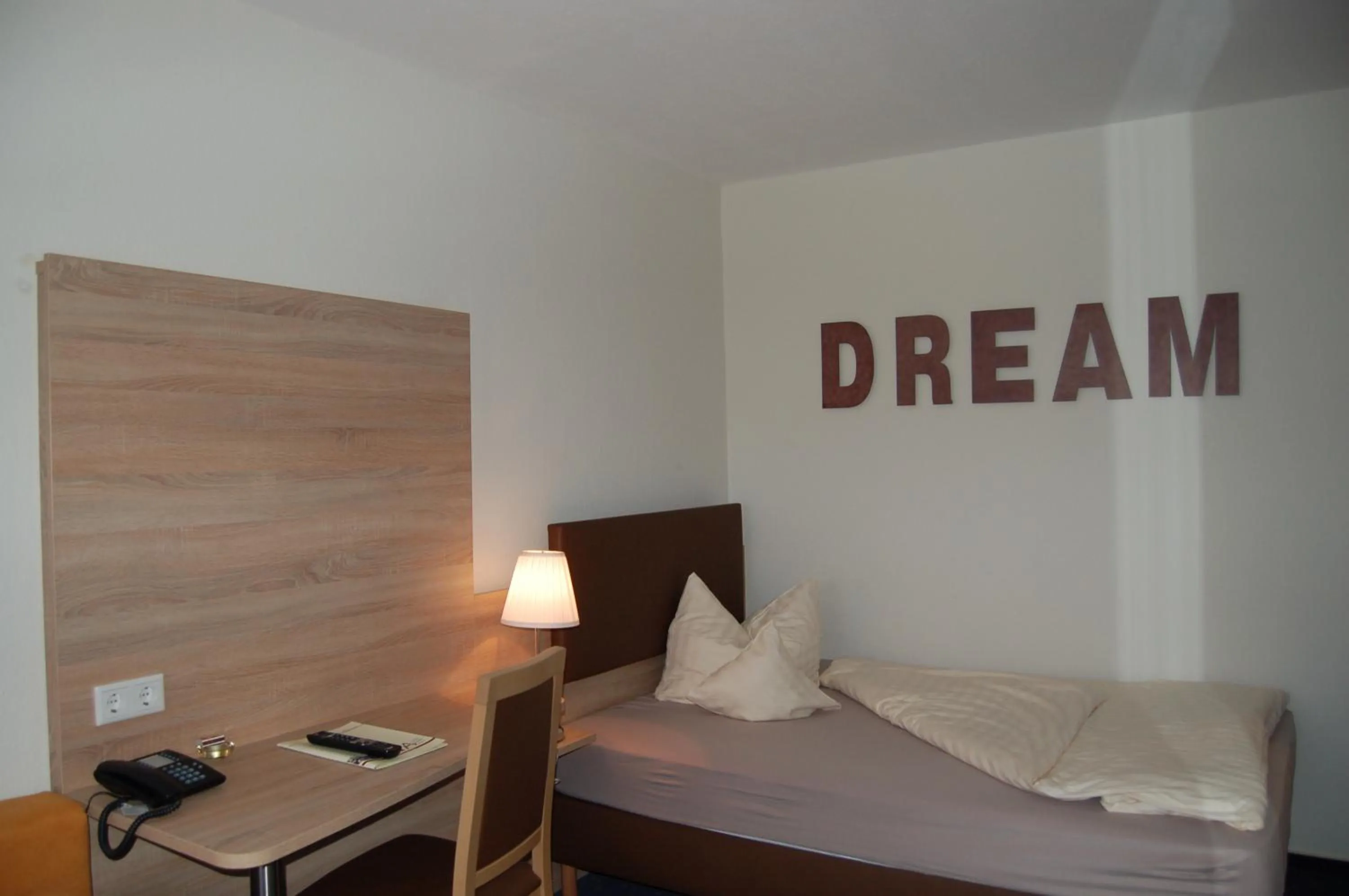 Photo of the whole room, Bed in Hotel-Restaurant Ammertmann