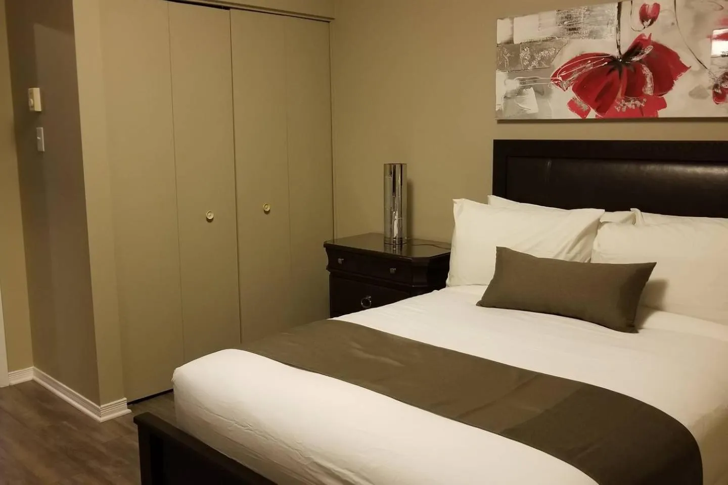 Bed in Sweet 2-Bedroom Penthouse Apartment by Amazing Property Rentals