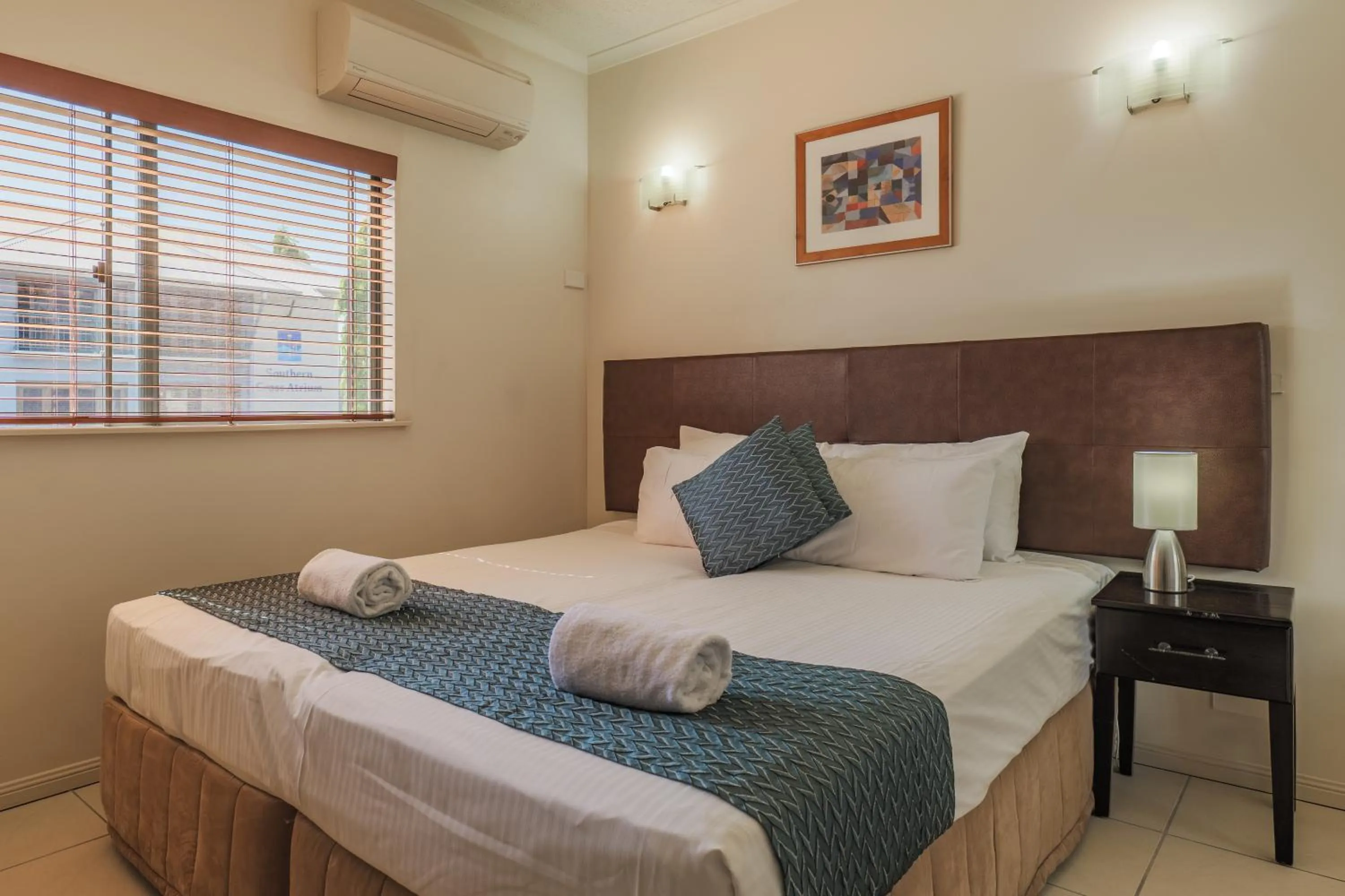 Bed in Southern Cross Atrium Apartments