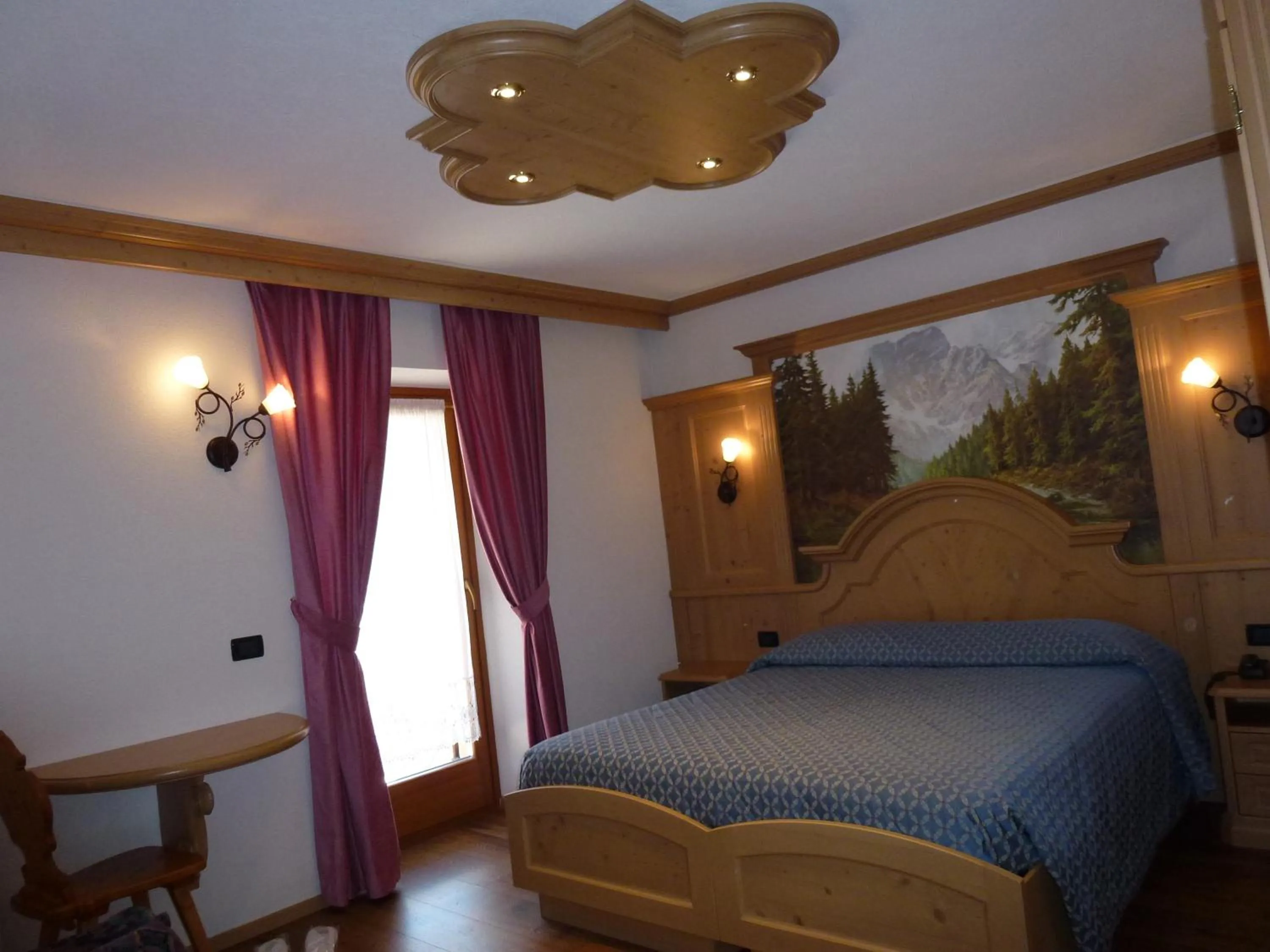 Bed in Hotel Laurino