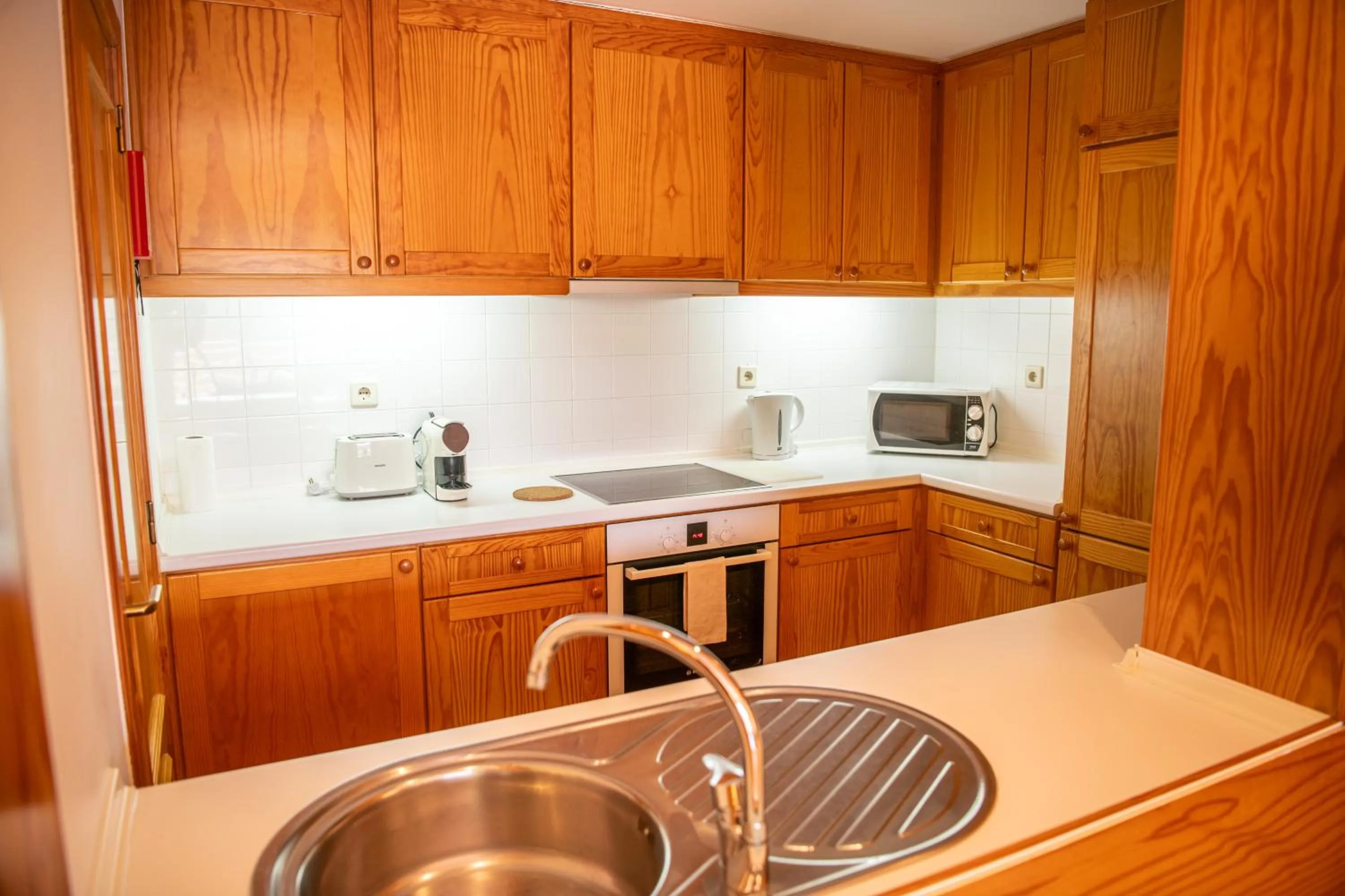 kitchen in Apartamentos do Lago