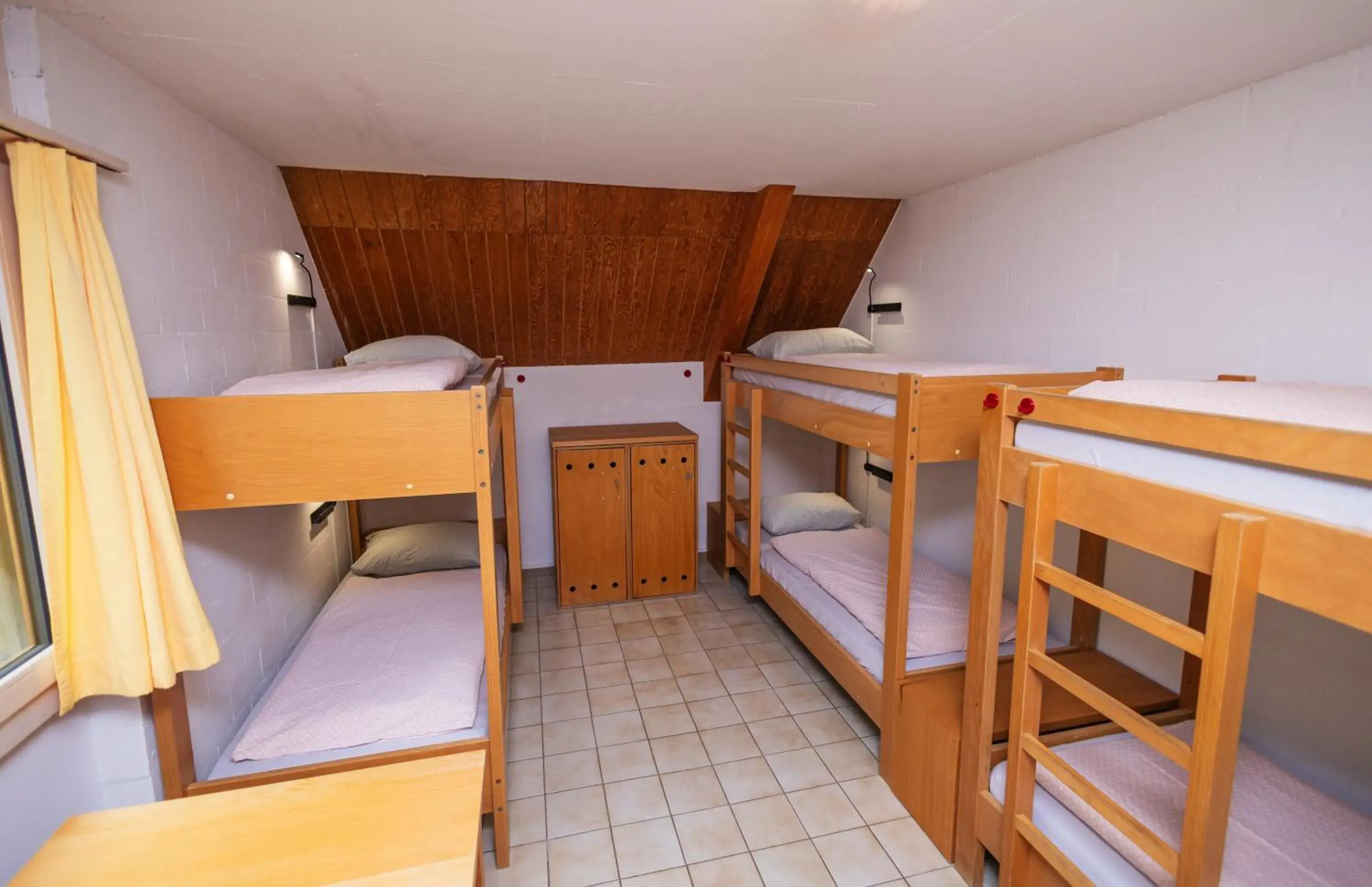 Bed in 6-Bed Dormitory Room in Delémont Youth Hostel Bed in 6-Bed Dormitory Room in Delémont Youth Hostel