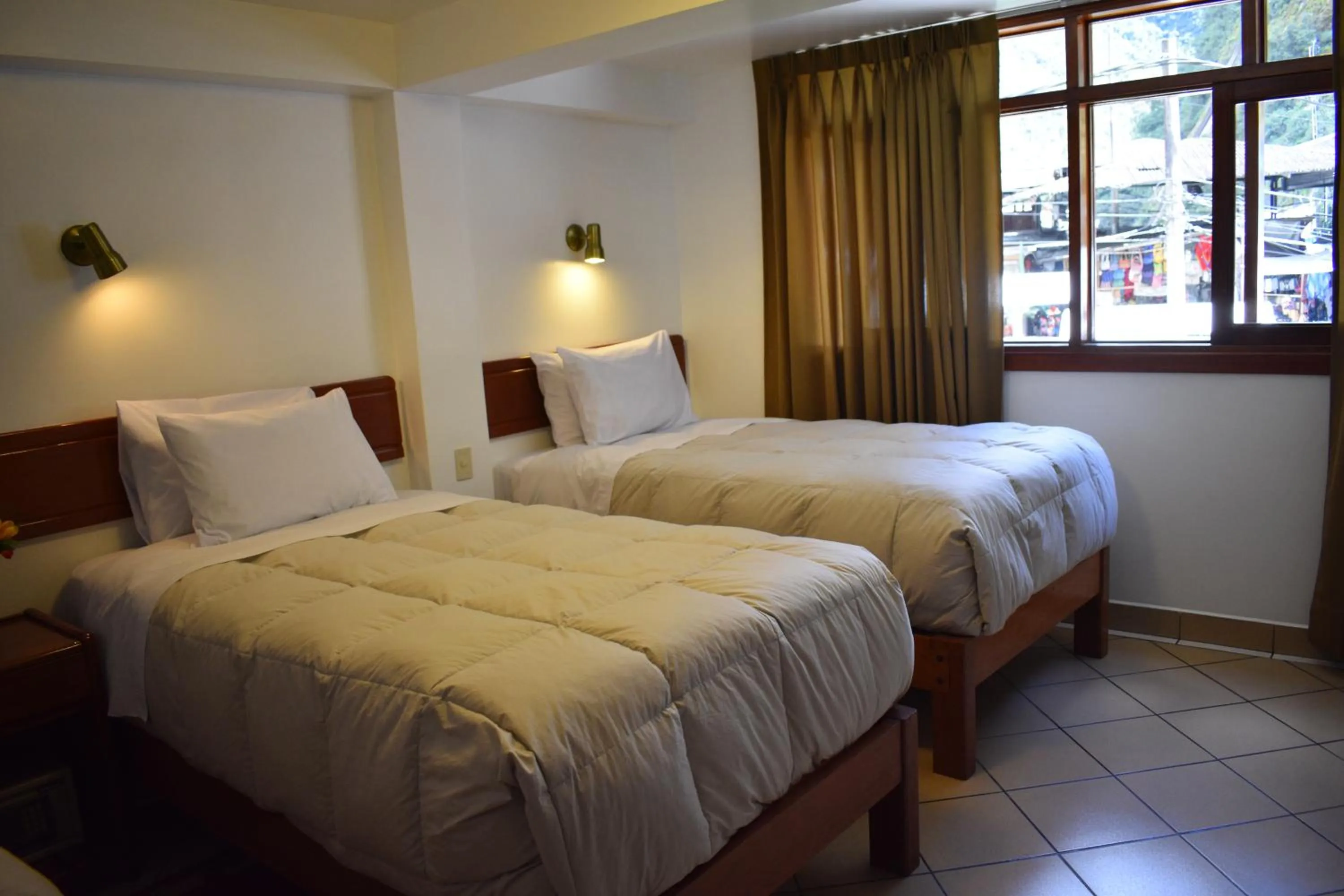 Bed in Casa De Luz Hotel