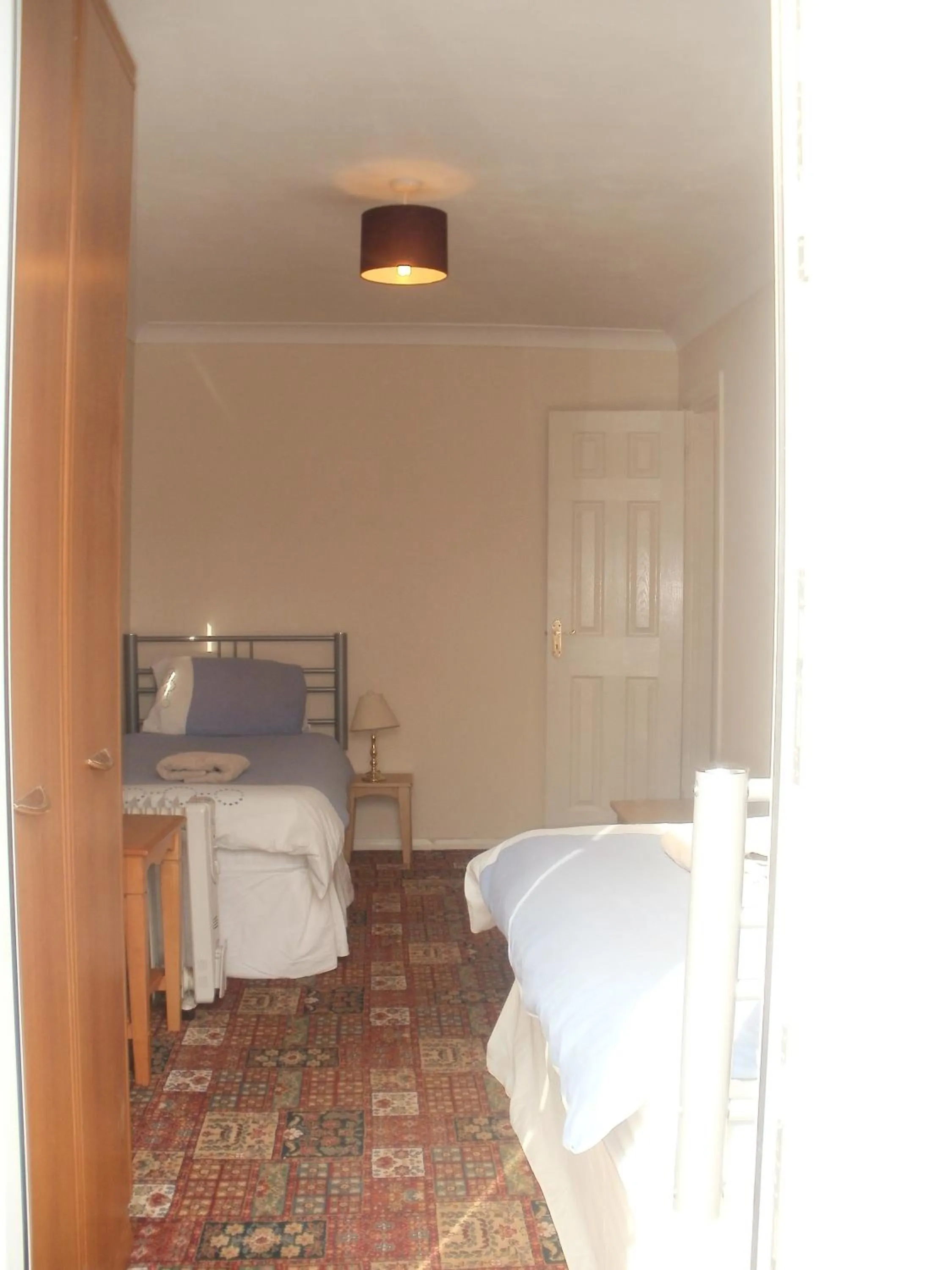 Decorative detail, Bed in London Heathrow Guesthouse