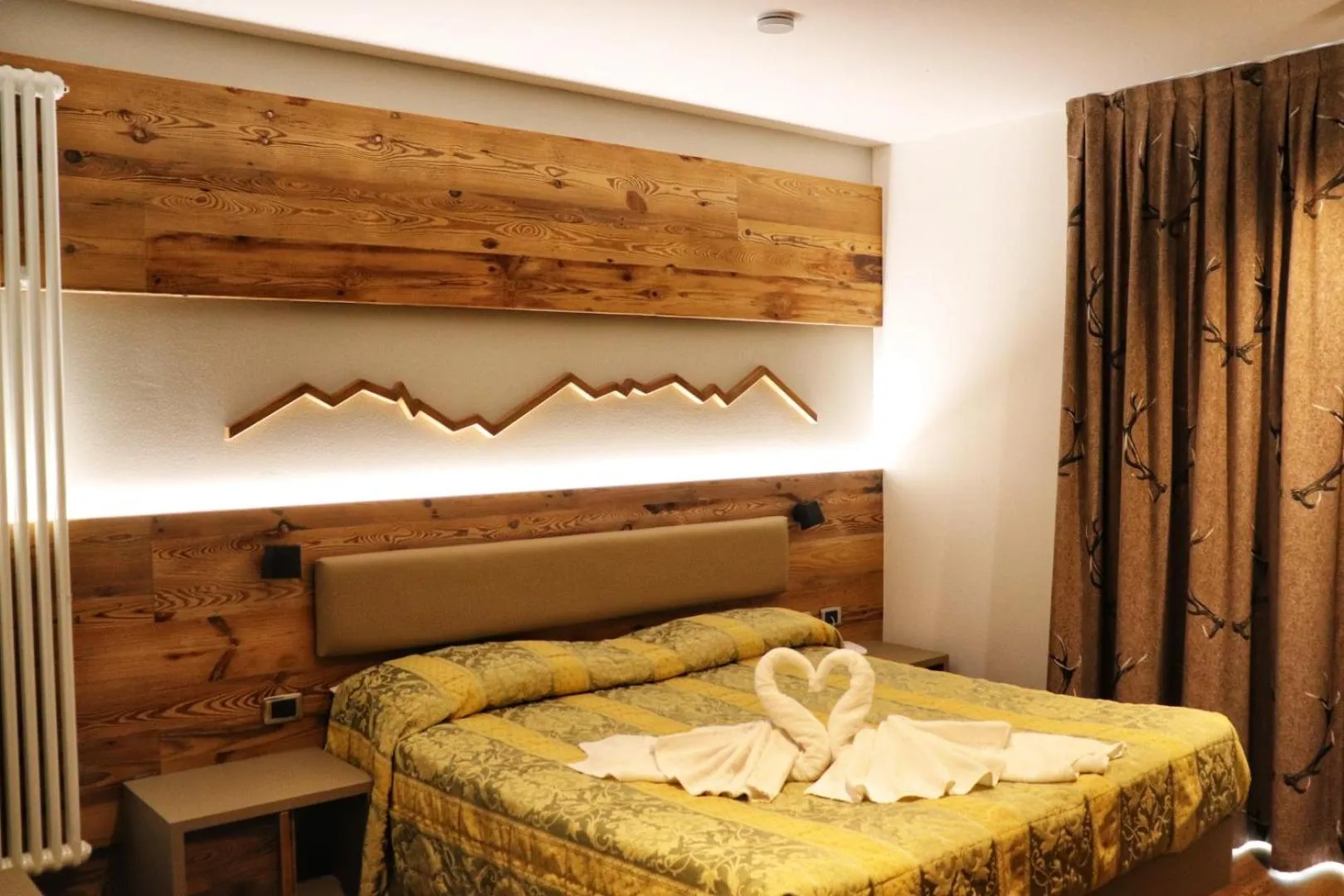 Bed in Hotel Panorama Wellness & Resort