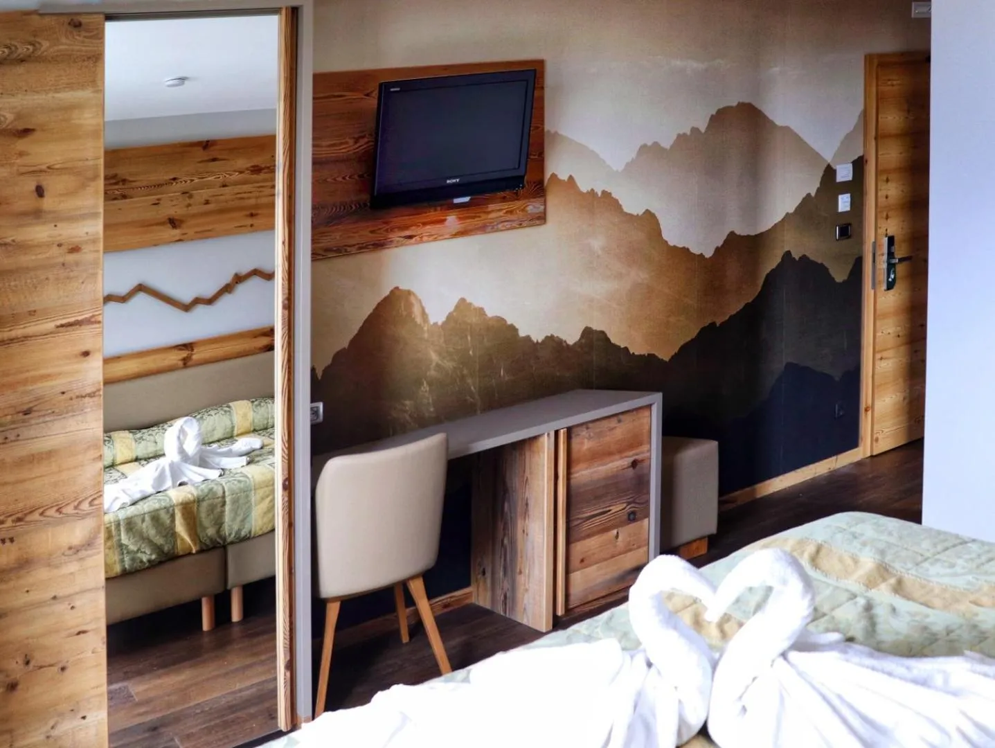 Bed in Hotel Panorama Wellness & Resort