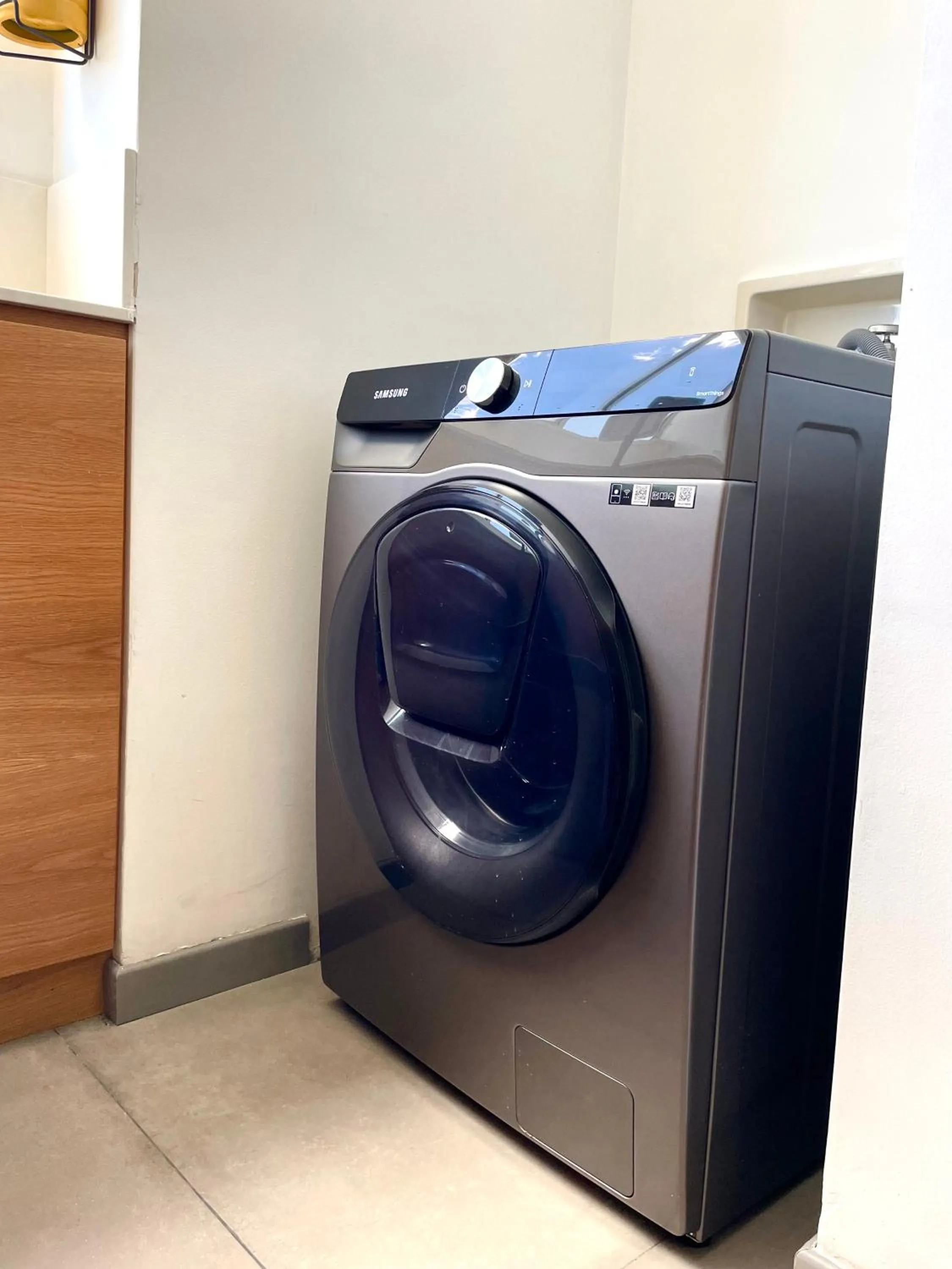 washing machine in Affinity ApartaHotel - Extended Stay