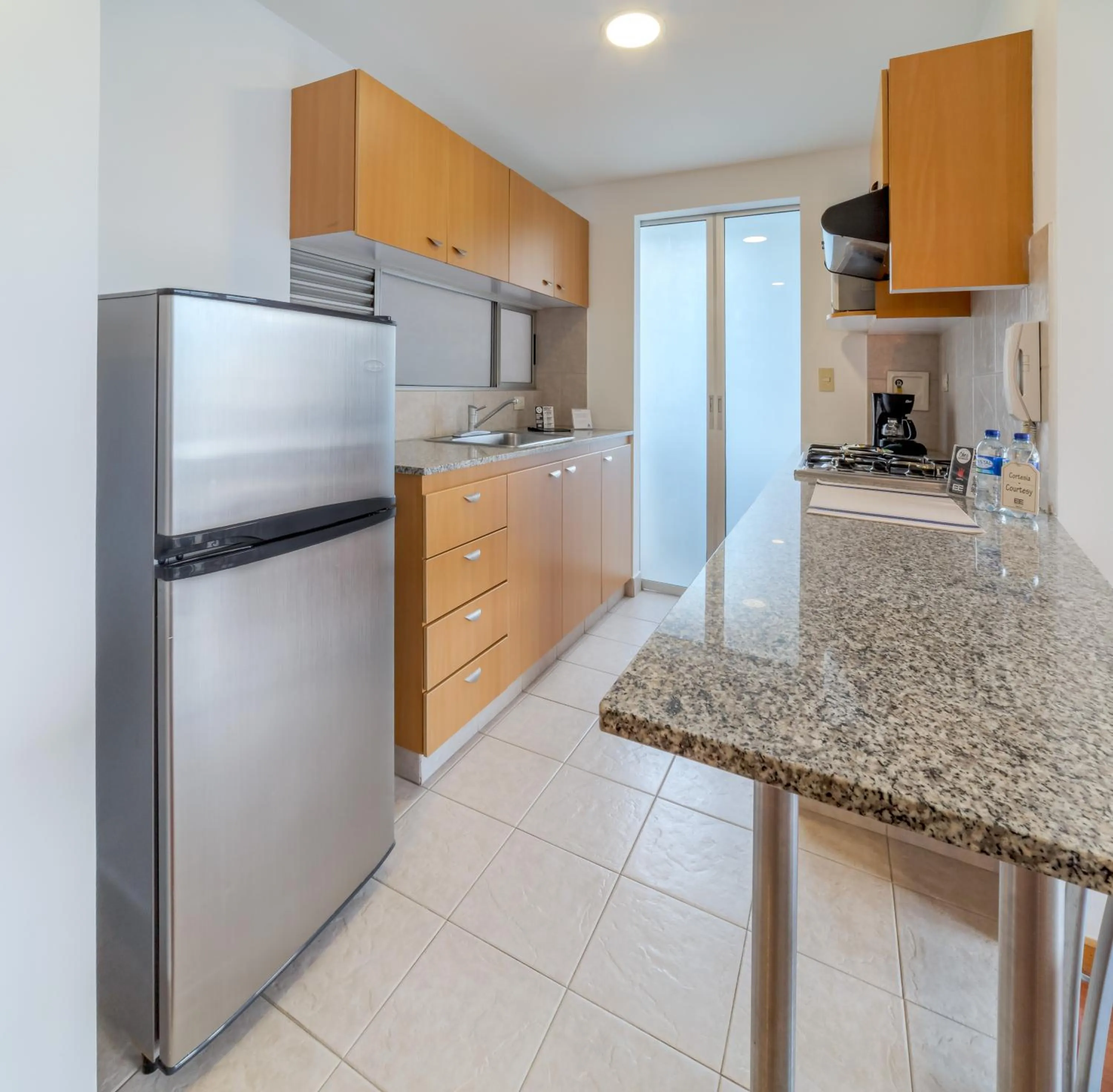 Kitchen or kitchenette in Affinity ApartaHotel - Extended Stay