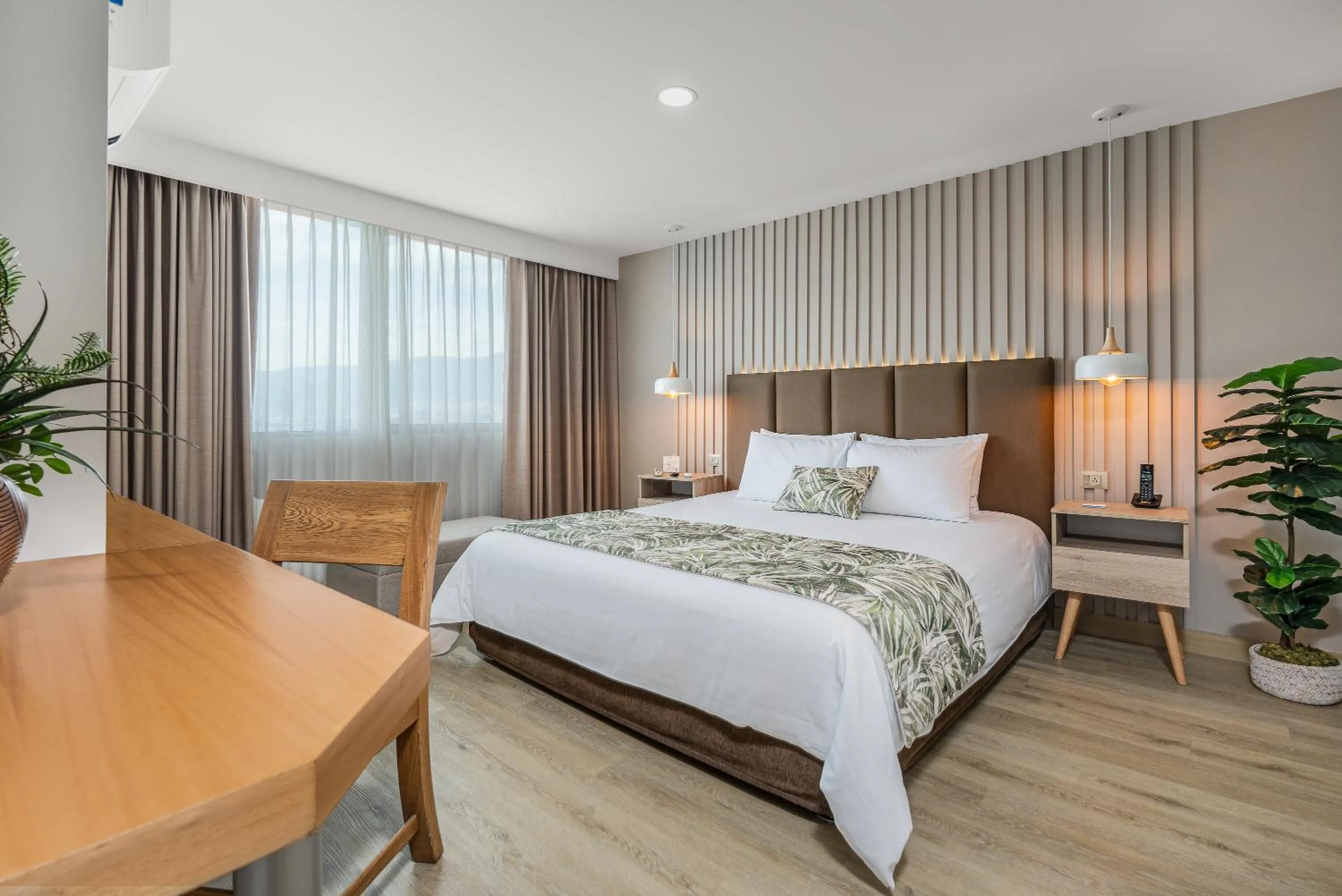 Bed in Affinity ApartaHotel - Extended Stay