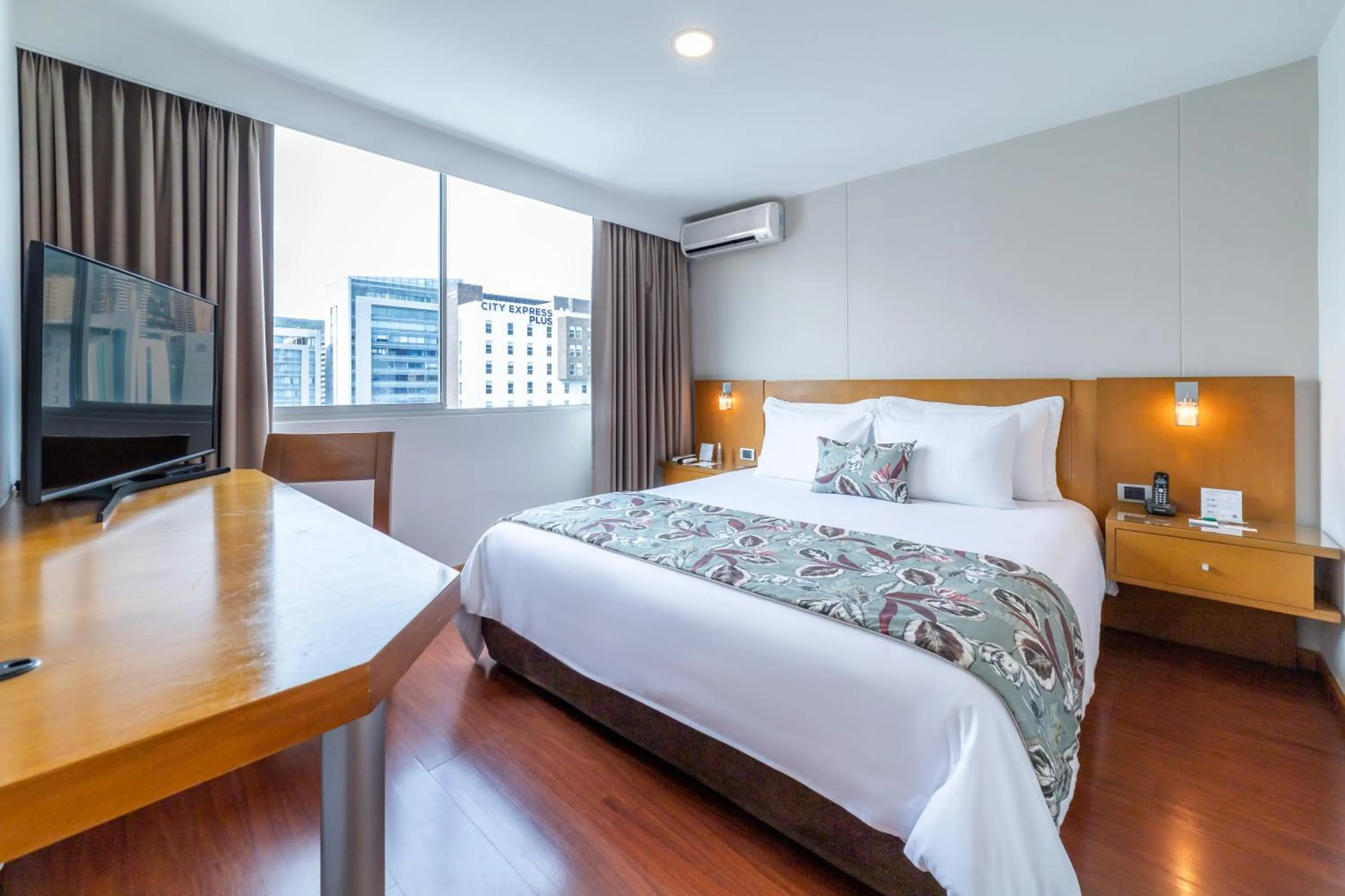 Bed in Affinity ApartaHotel - Extended Stay